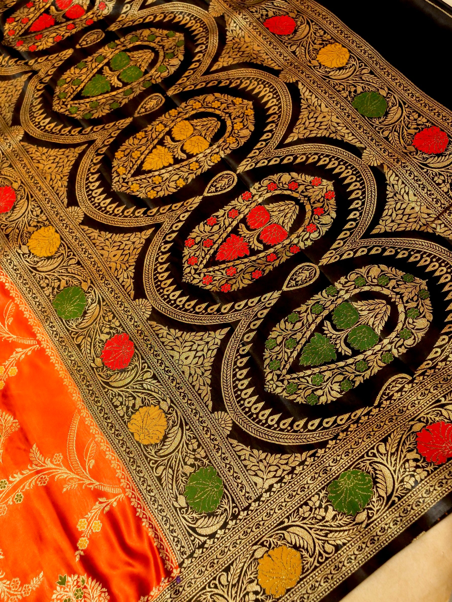 Vibrant Orange Satin Mashru Silk Saree with Black & Gold Zari Border