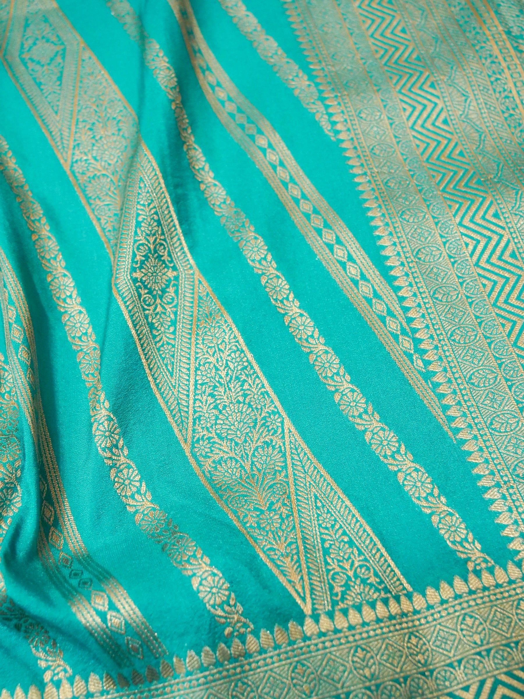 Teal Crepe Georgette Silk Saree with Gold Zari