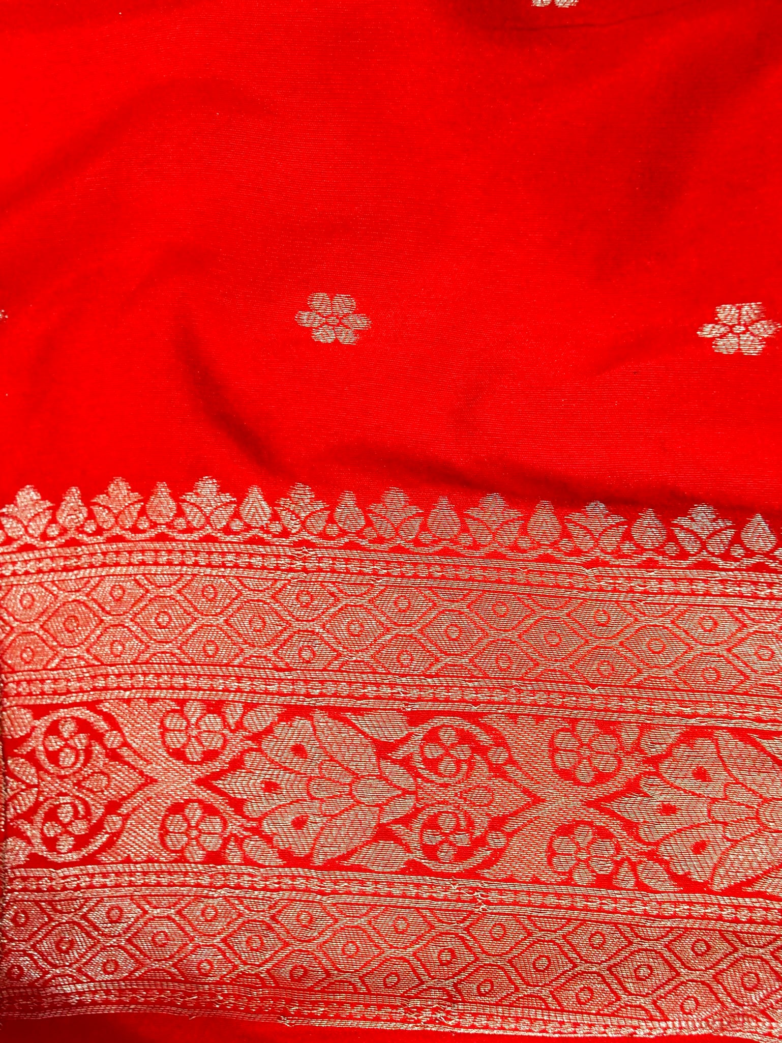 Pastel Orange Crepe Georgette Silk Saree with Red Border