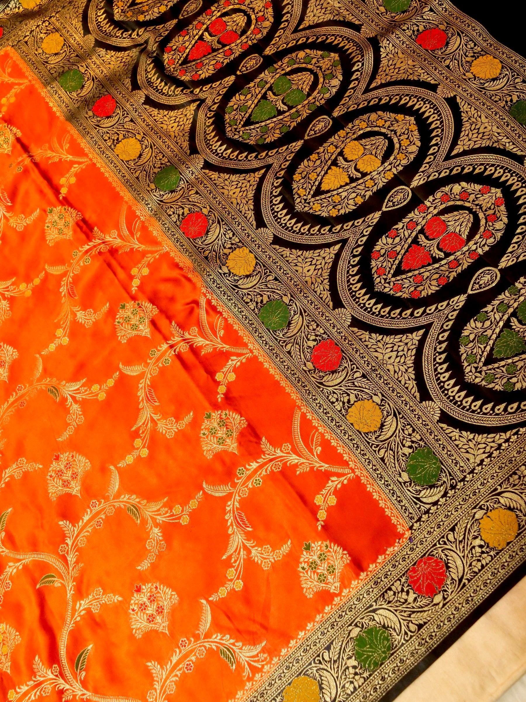 Vibrant Orange Satin Mashru Silk Saree with Black & Gold Zari Border
