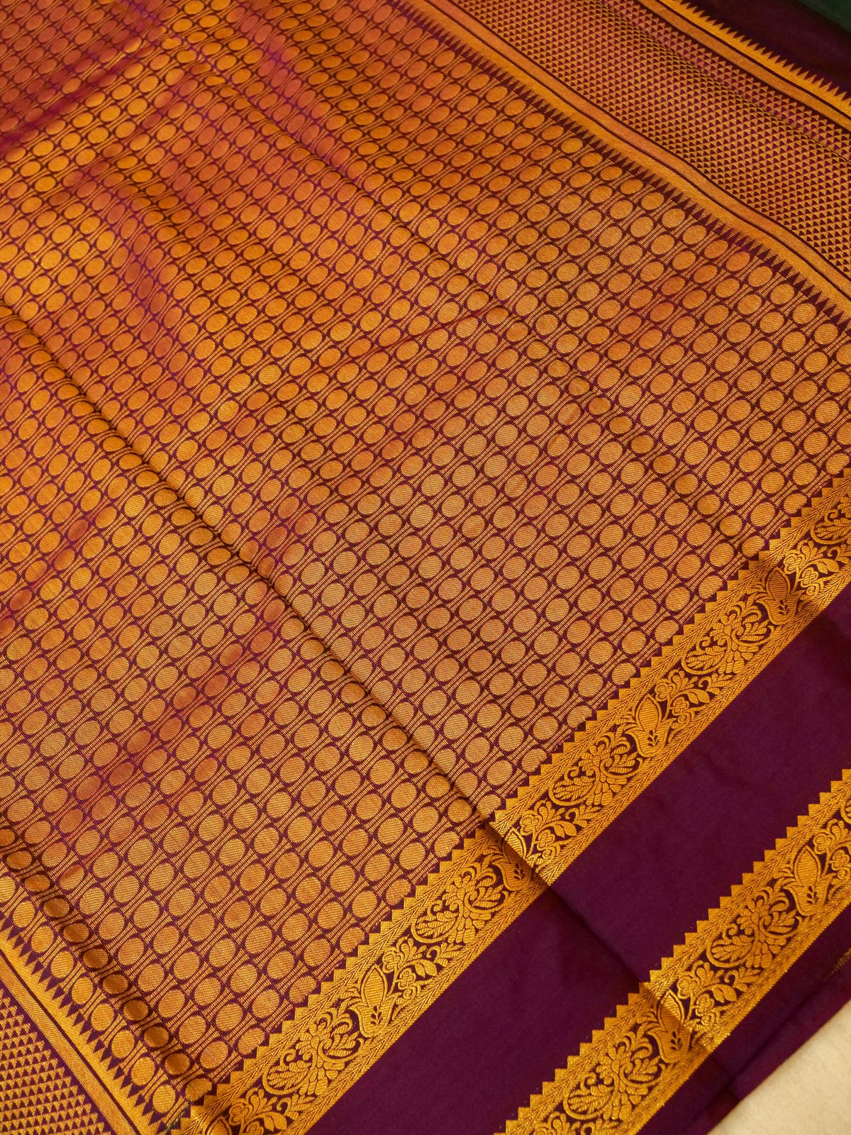Devi - Forest Green Kanjivaram Silk Saree with Korvai Border