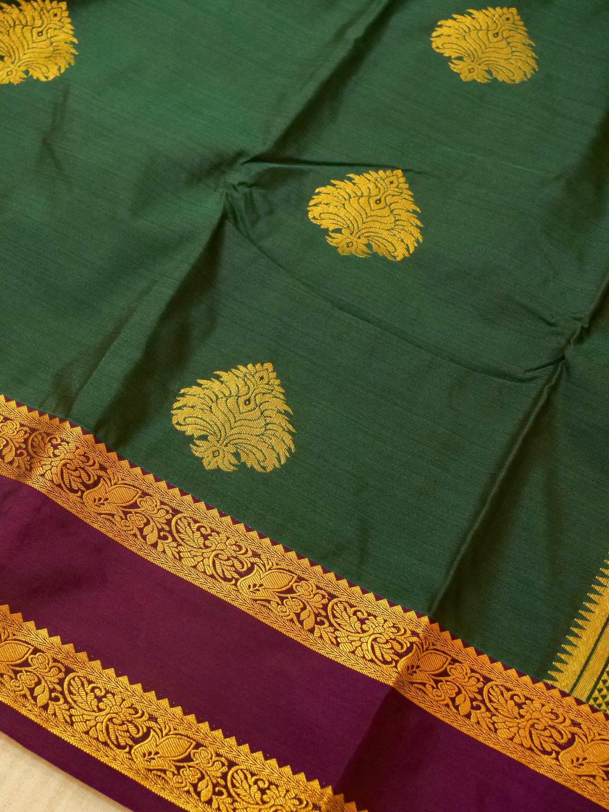 Devi - Forest Green Kanjivaram Silk Saree with Korvai Border