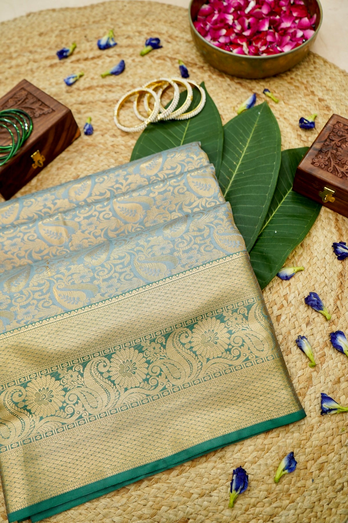 Devyani - Sky Blue Kanchi Pattu Silk Saree with Teal Green Border