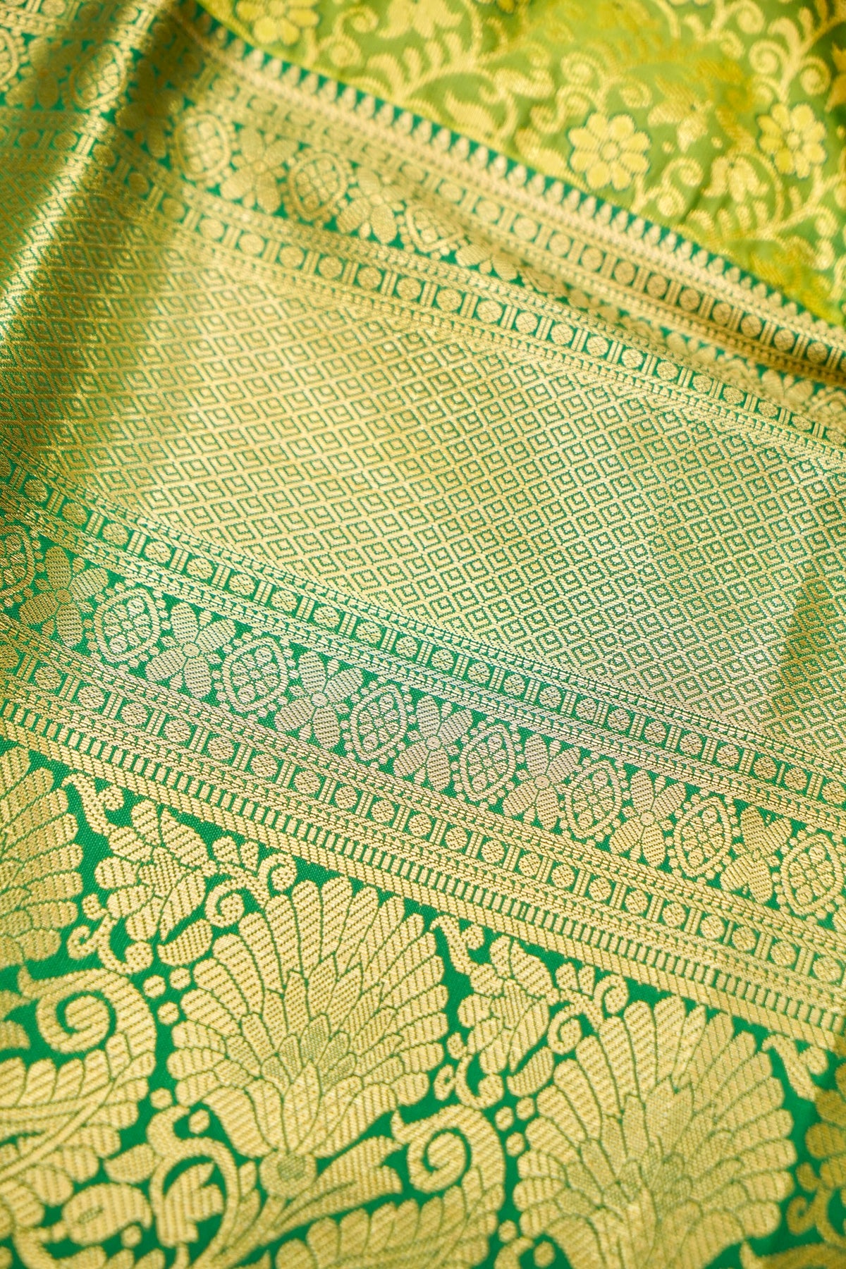 Devyani - Lime Green Kanchi Pattu Silk Saree with Emerald Green Border