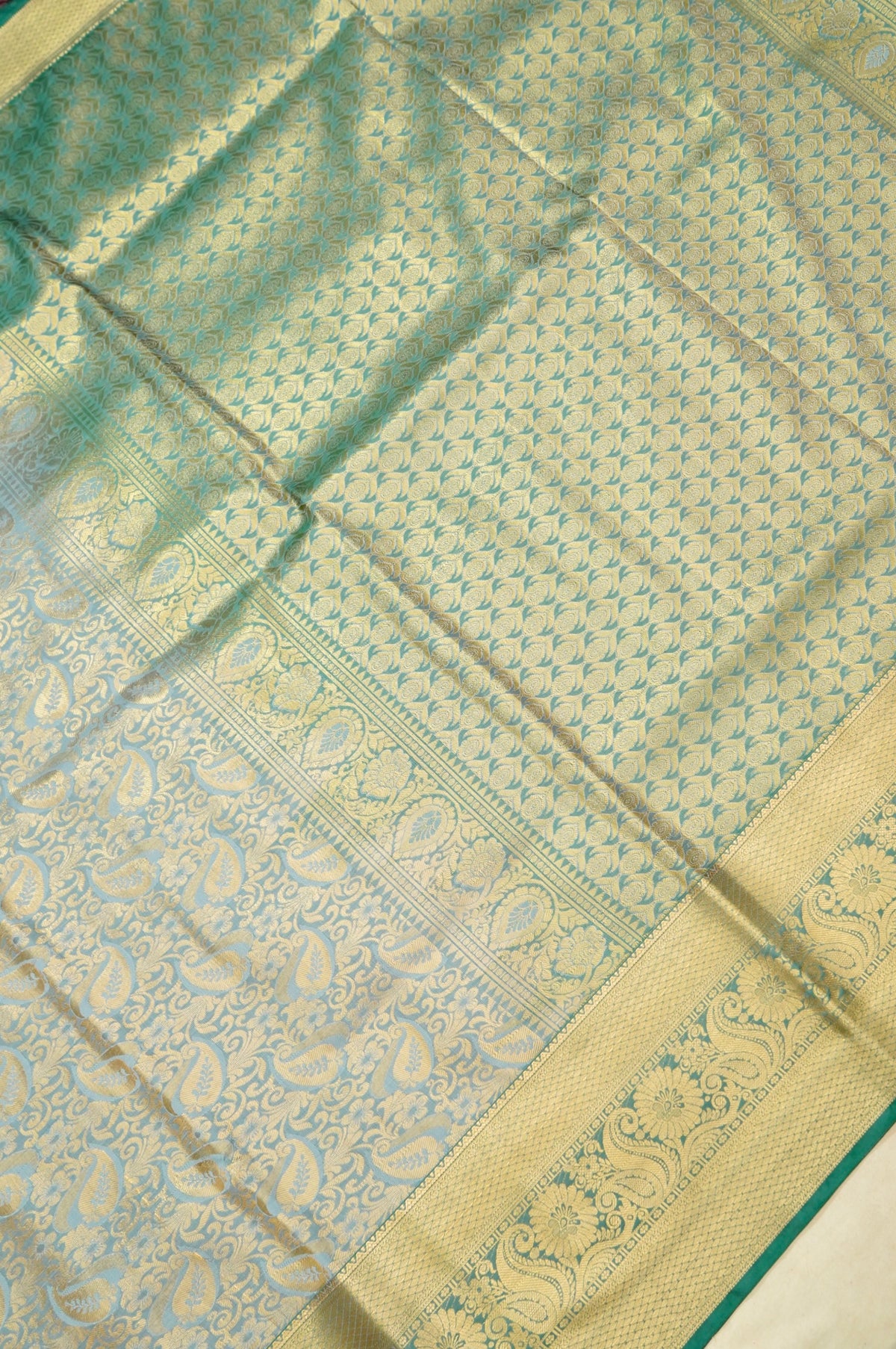 Devyani - Sky Blue Kanchi Pattu Silk Saree with Teal Green Border