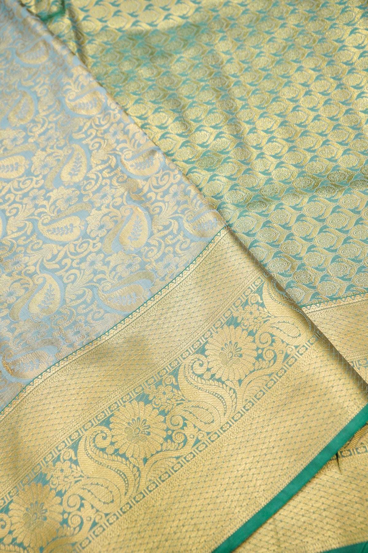 Devyani - Sky Blue Kanchi Pattu Silk Saree with Teal Green Border