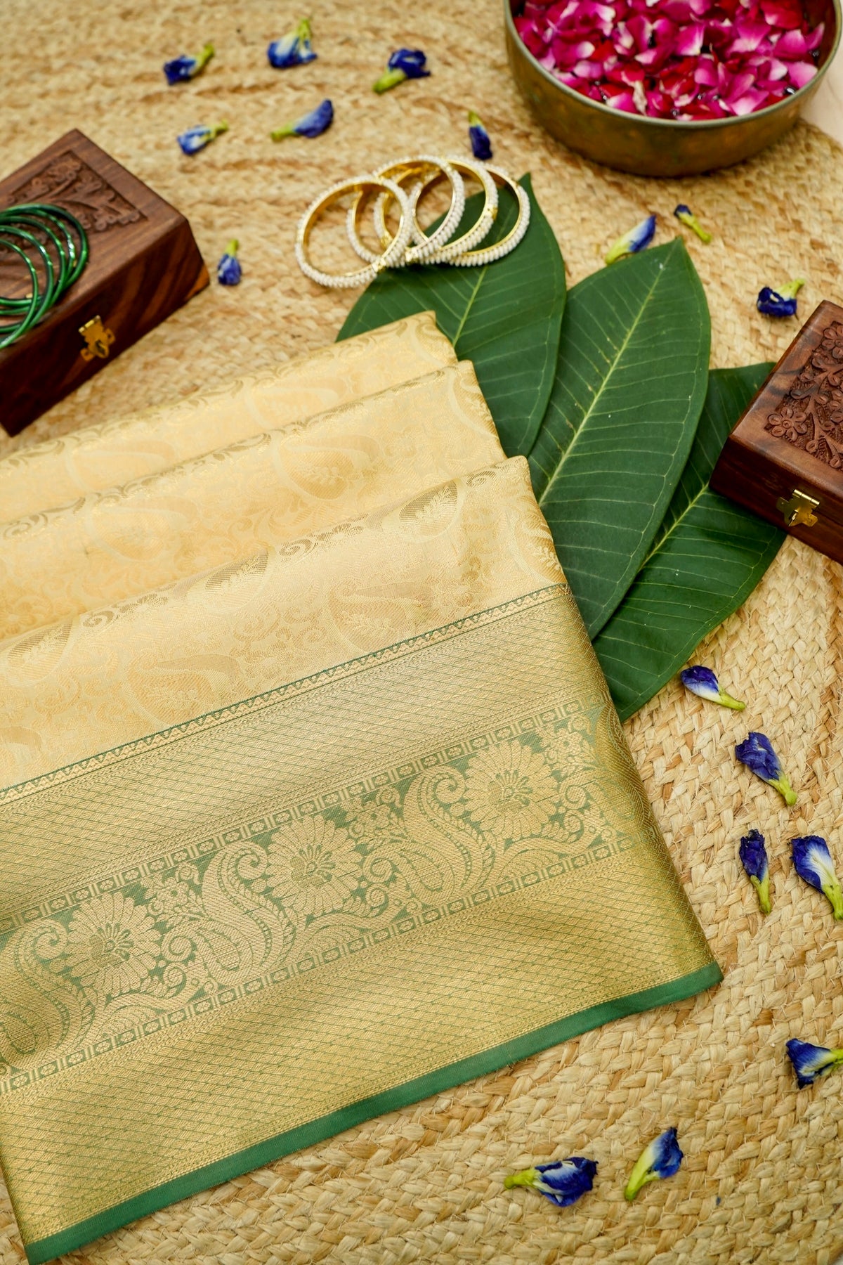 Devyani - Pastel Yellow Kanchi Pattu Silk Saree with Green Border