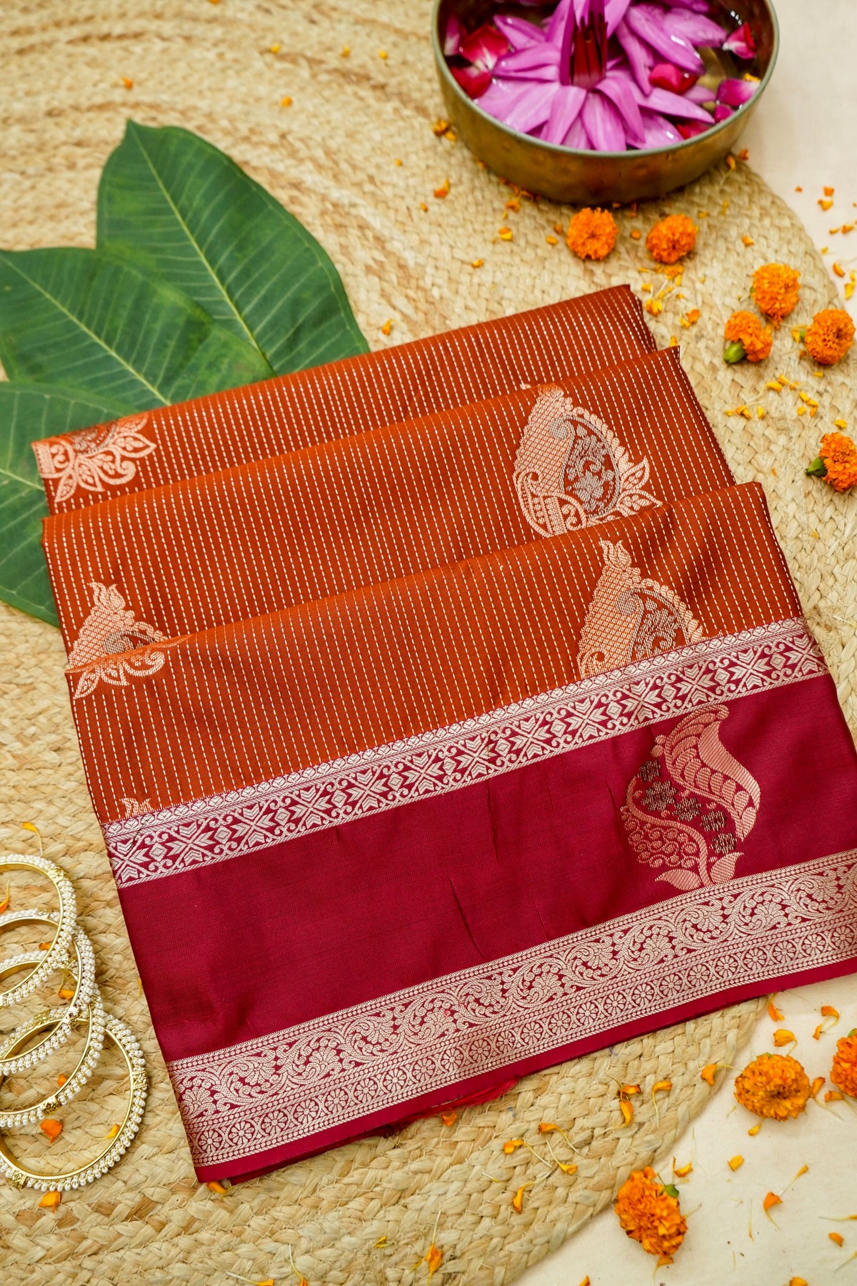 Devyani - Burnt Orange Kanjivaram Silk Saree with Pink Korvai Border