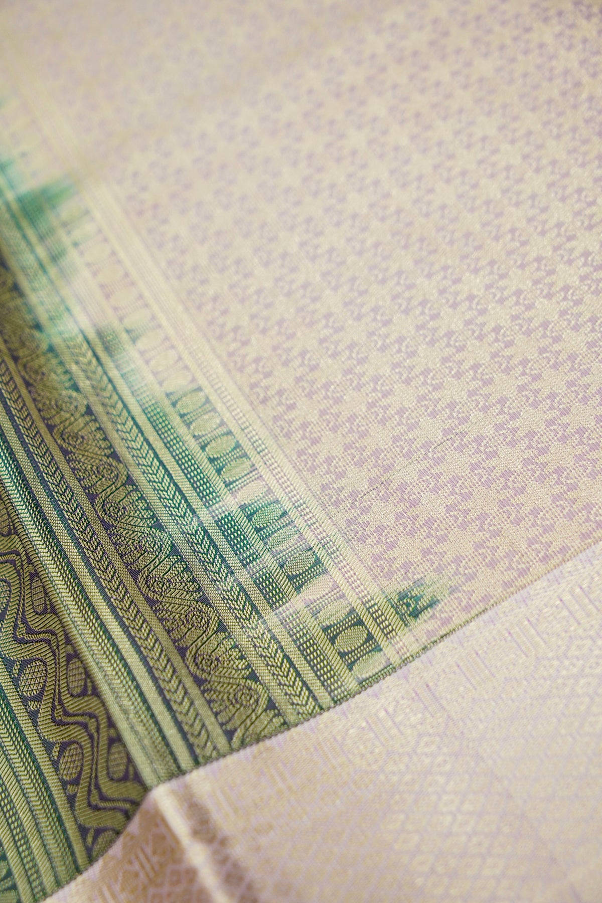 Devyani - Peacock Teal Vintage Style Kanjivaram Silk Saree with Lavender Korvai Border