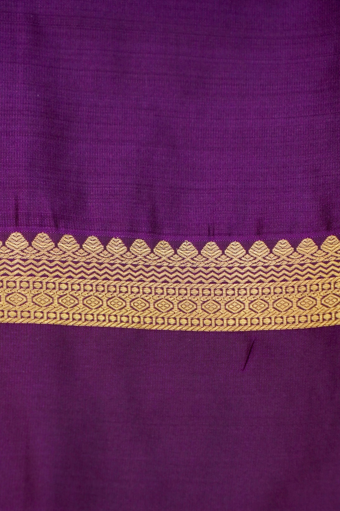 Devyani - Black Kanjivaram Silk Saree with Royal Purple Korvai Border