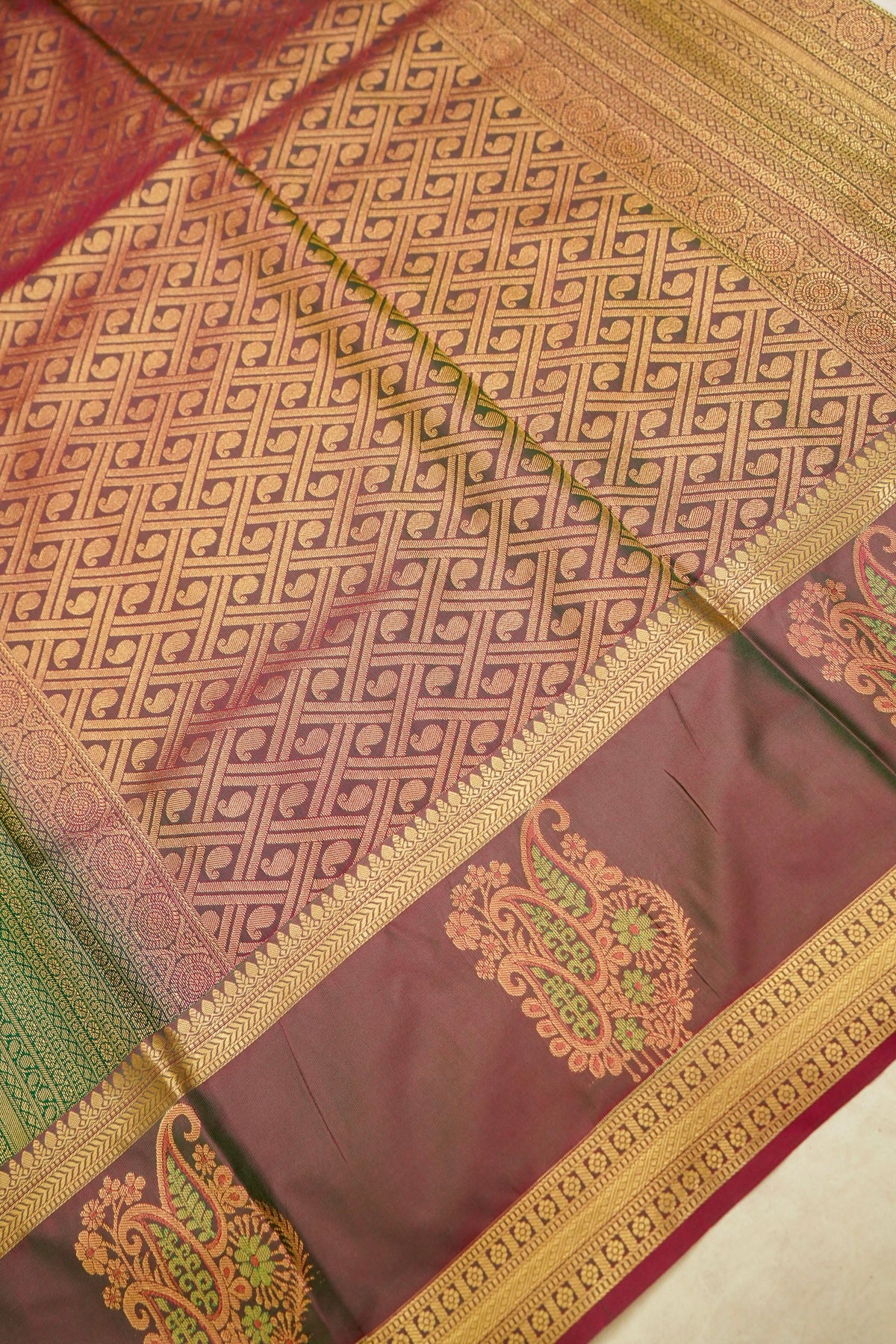 Devyani - Emerald Green Kanjivaram Silk Saree with Mauve Korvai Border
