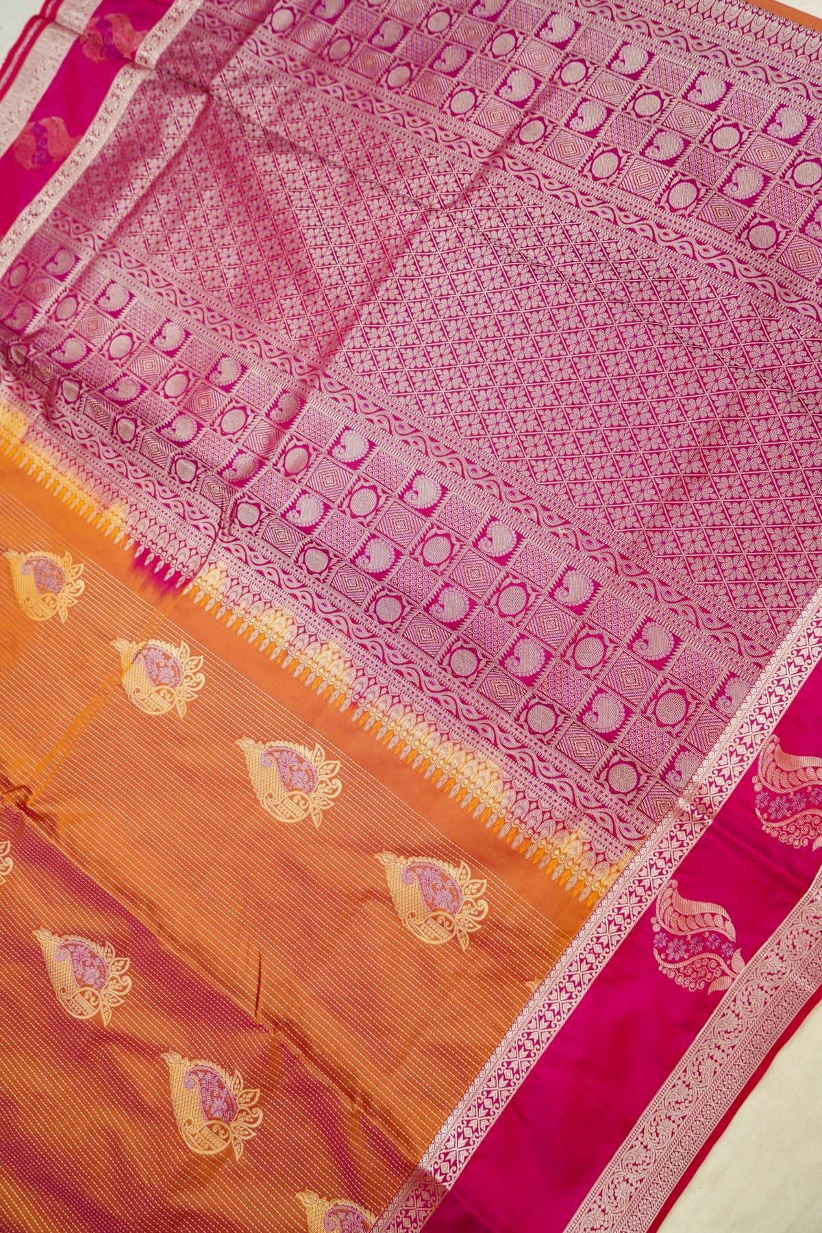 Devyani - Copper Orange Kanjivaram Silk Saree with Pink Korvai Border