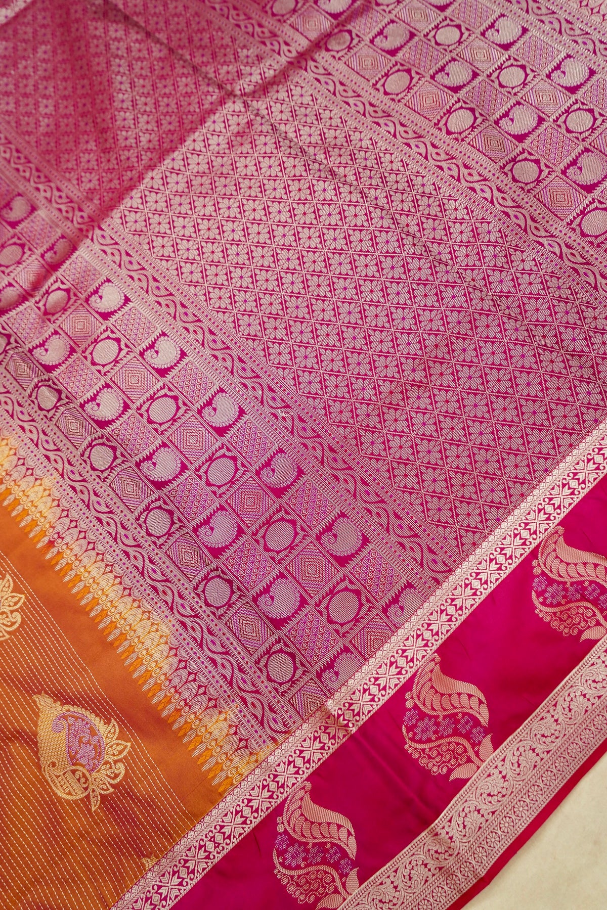 Devyani - Copper Orange Kanjivaram Silk Saree with Pink Korvai Border
