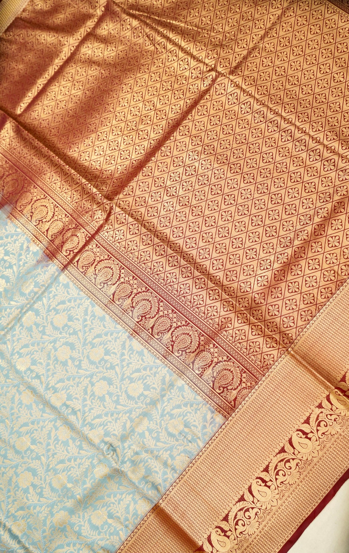 Devyani - Powder Blue Kanchi Pattu Silk Saree with Deep Maroon Korvai Border