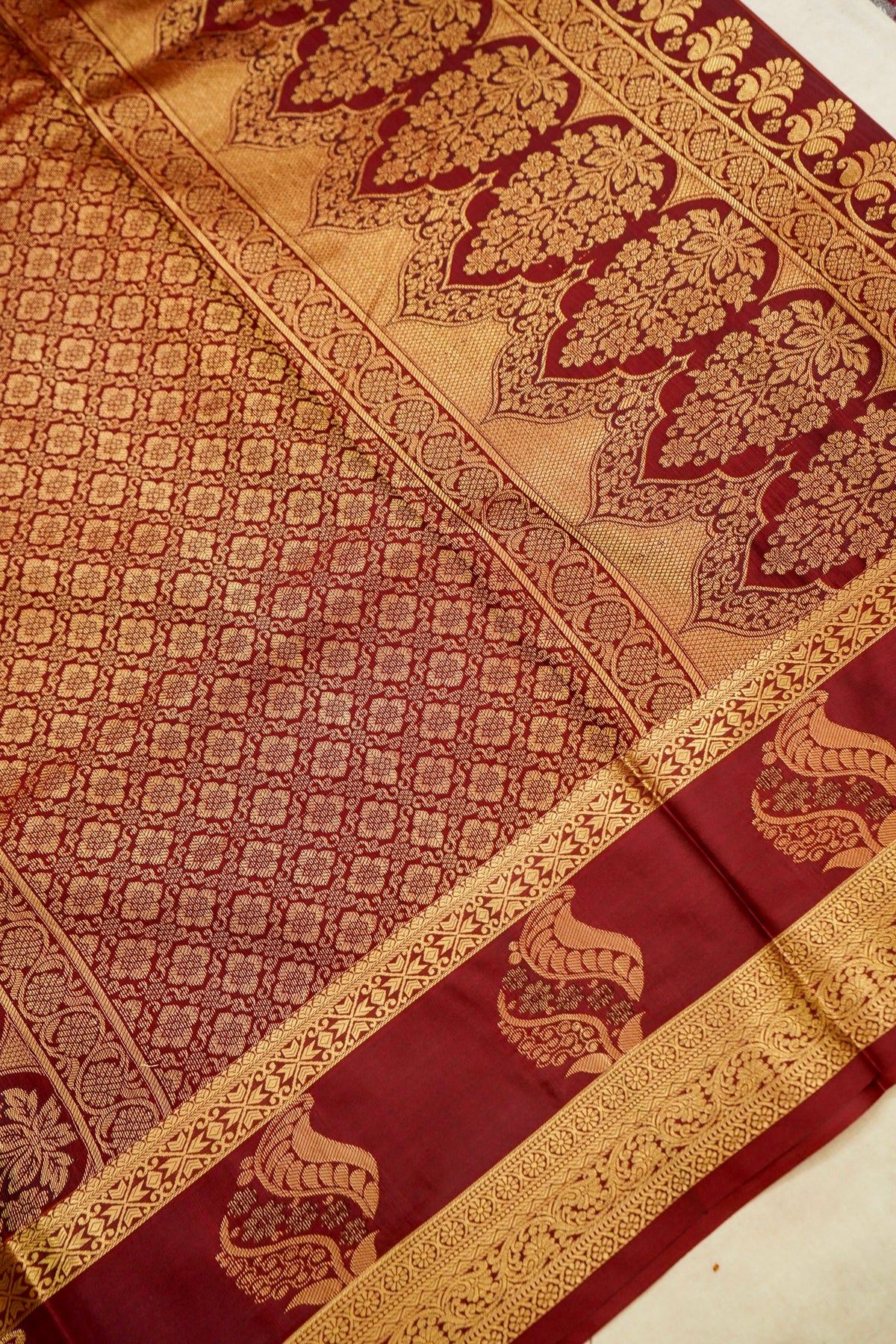 Devyani - Rust Orange Kanjivaram Silk Saree with Burgundy Korvai Border