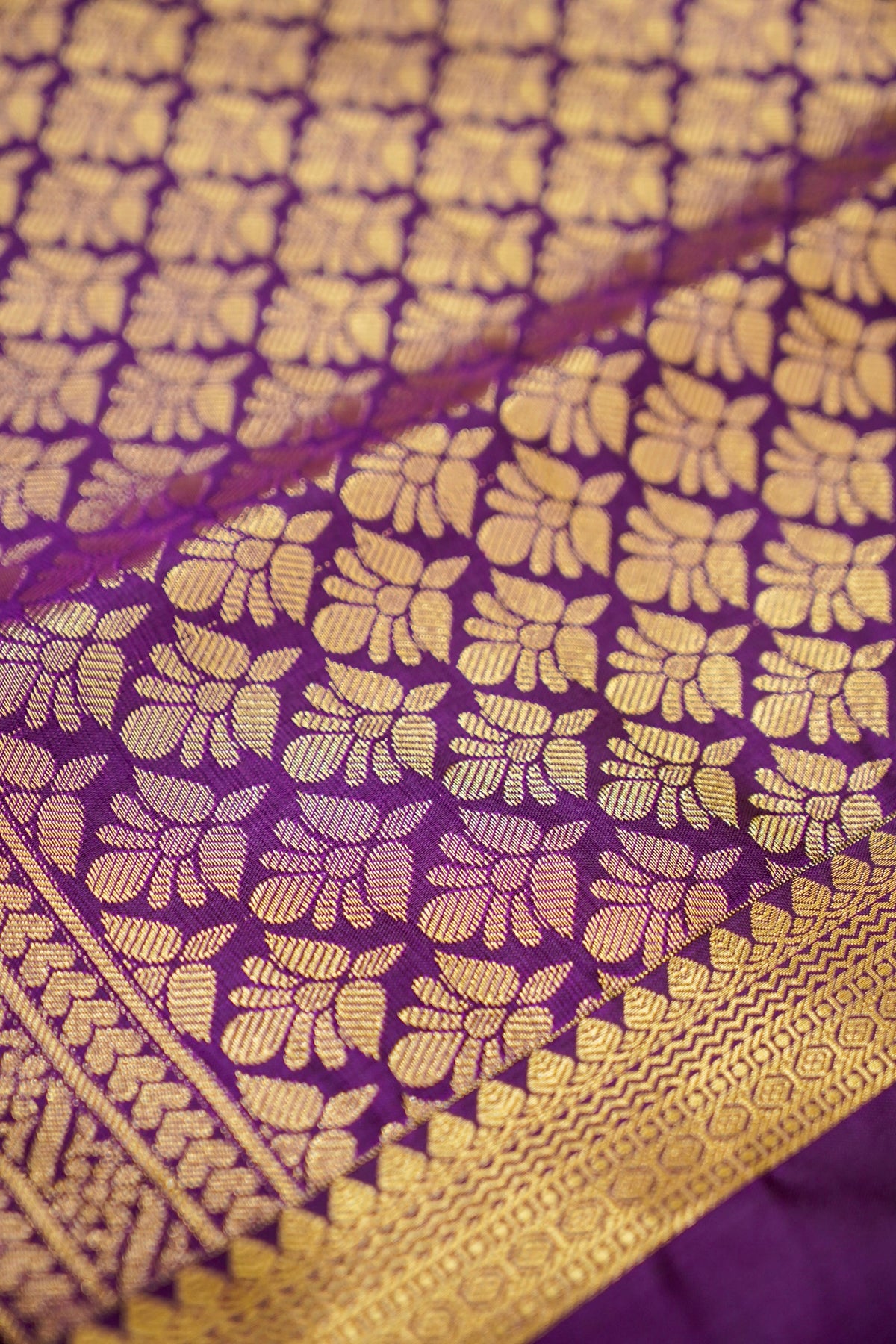 Devyani - Olive Green Kanjivaram Silk Saree with Purple Korvai Border