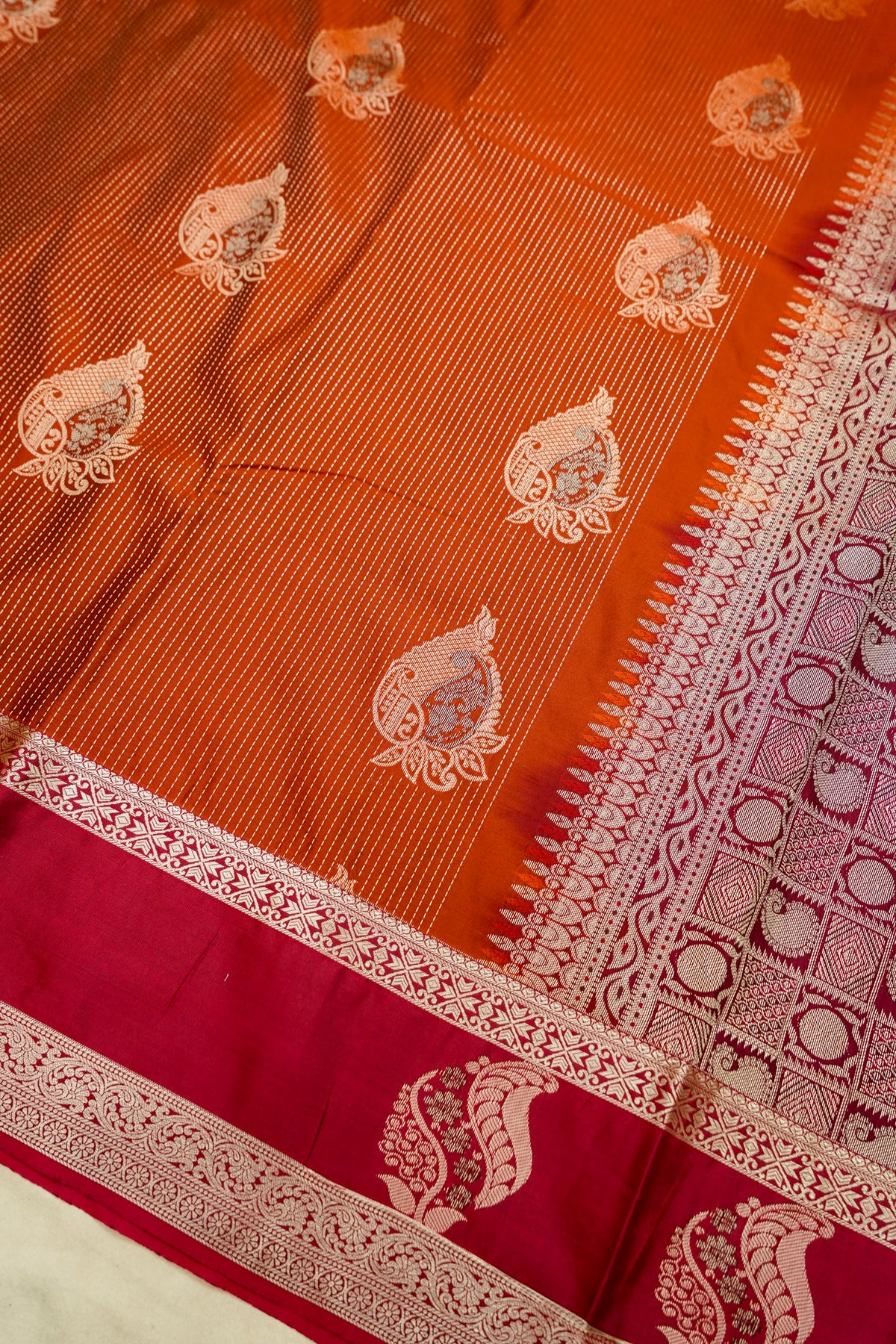 Devyani - Burnt Orange Kanjivaram Silk Saree with Pink Korvai Border