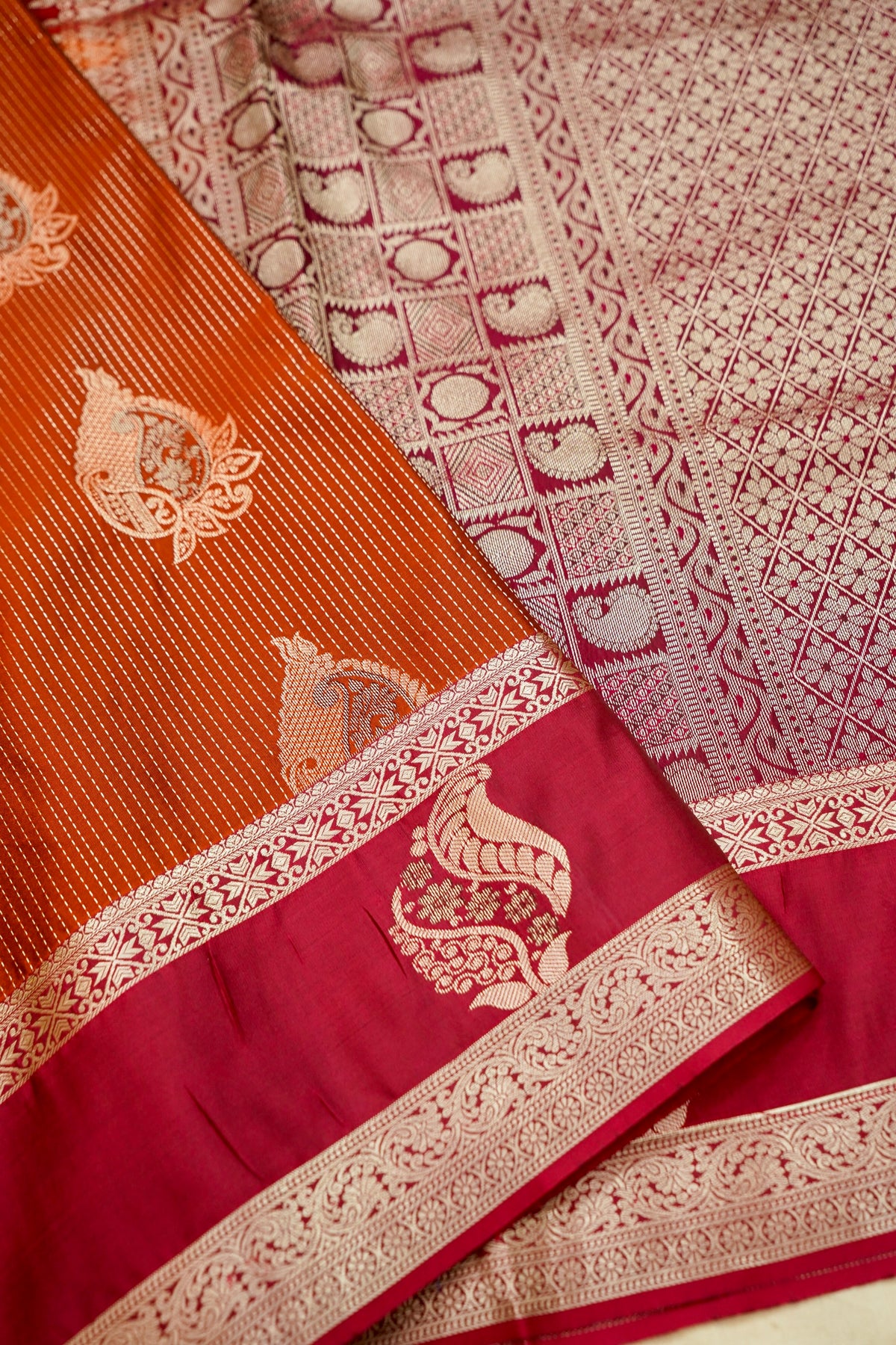 Devyani - Burnt Orange Kanjivaram Silk Saree with Pink Korvai Border
