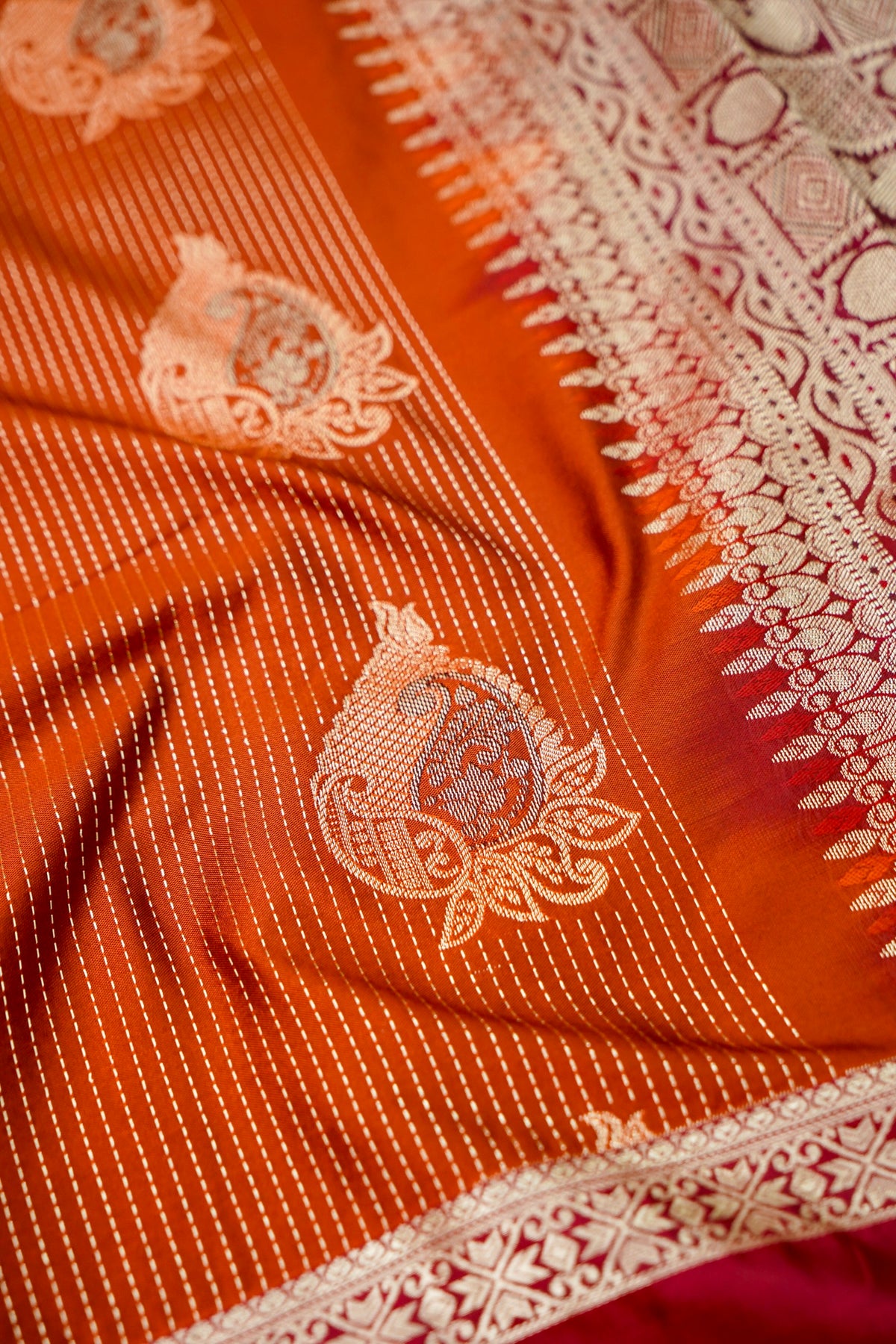 Devyani - Burnt Orange Kanjivaram Silk Saree with Pink Korvai Border