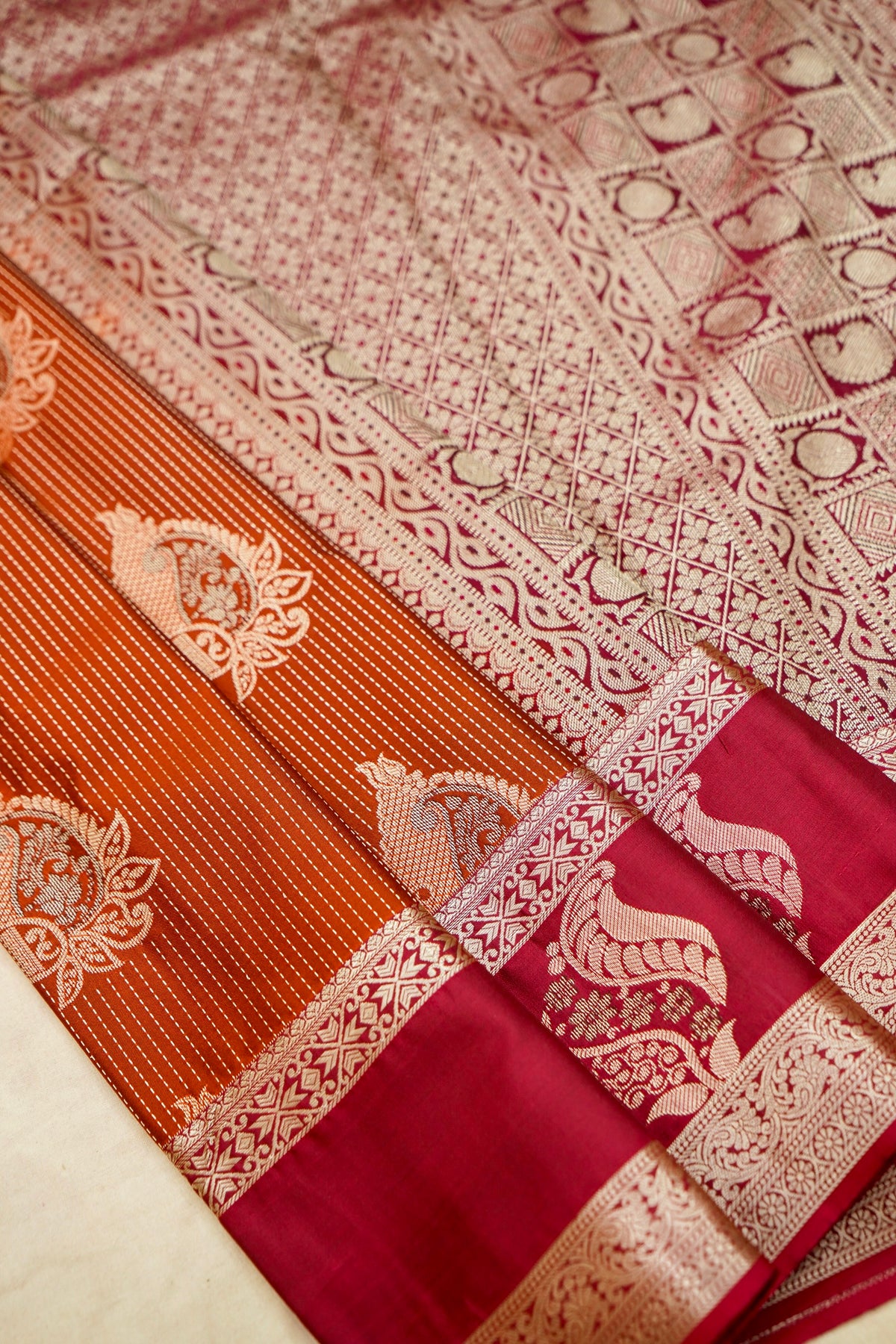Devyani - Burnt Orange Kanjivaram Silk Saree with Pink Korvai Border