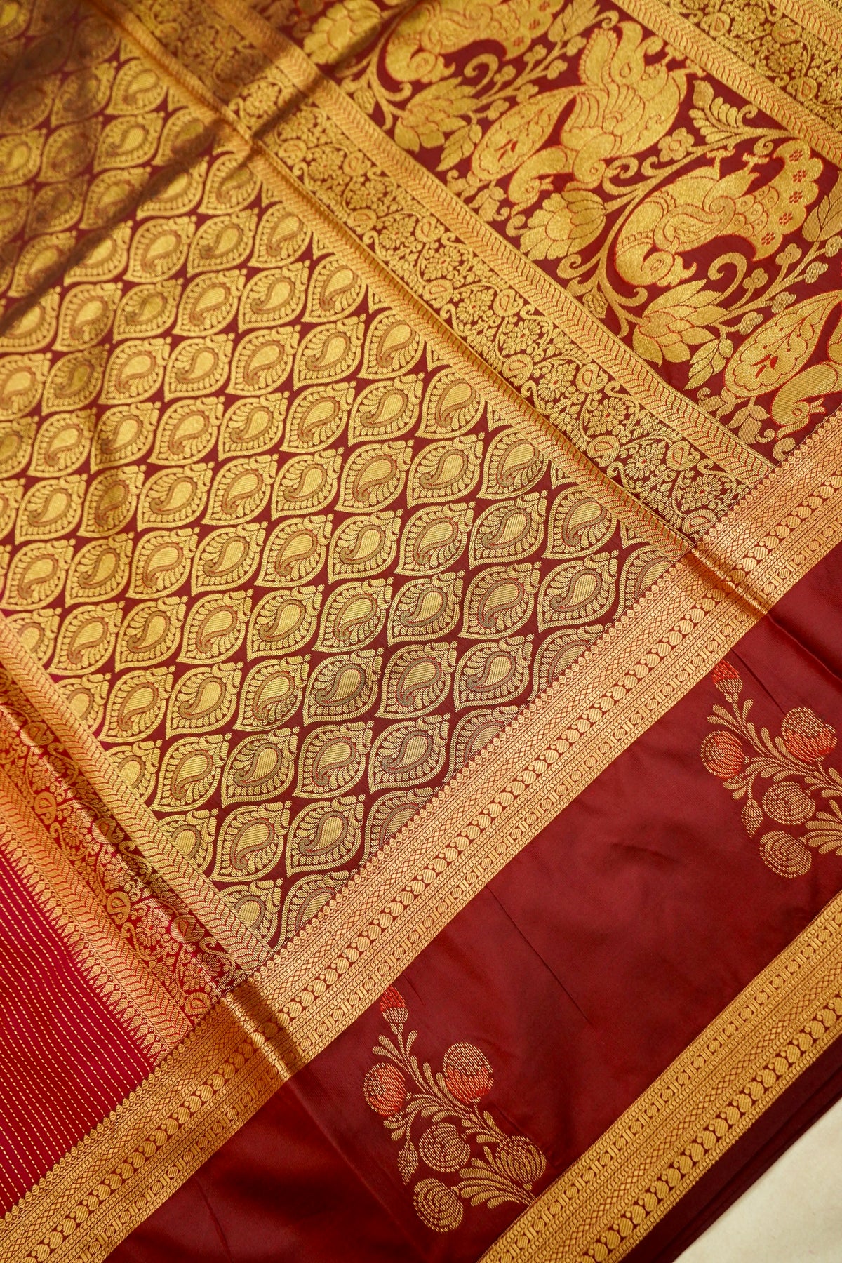 Devyani - Ruby Red Kanjivaram Silk Saree with Maroon Korvai Border