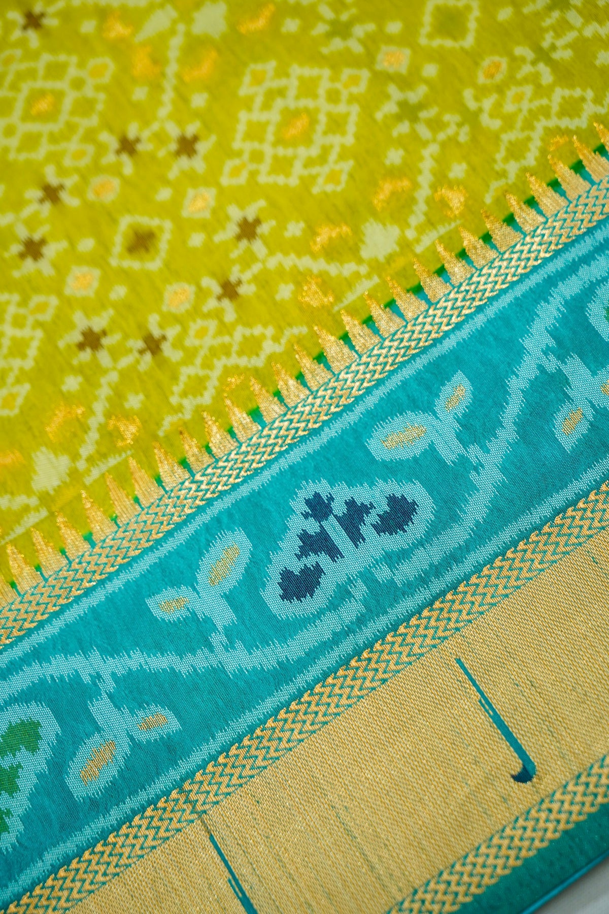 Lime Dupion Silk Patola Saree with Contrast Turquoise Border