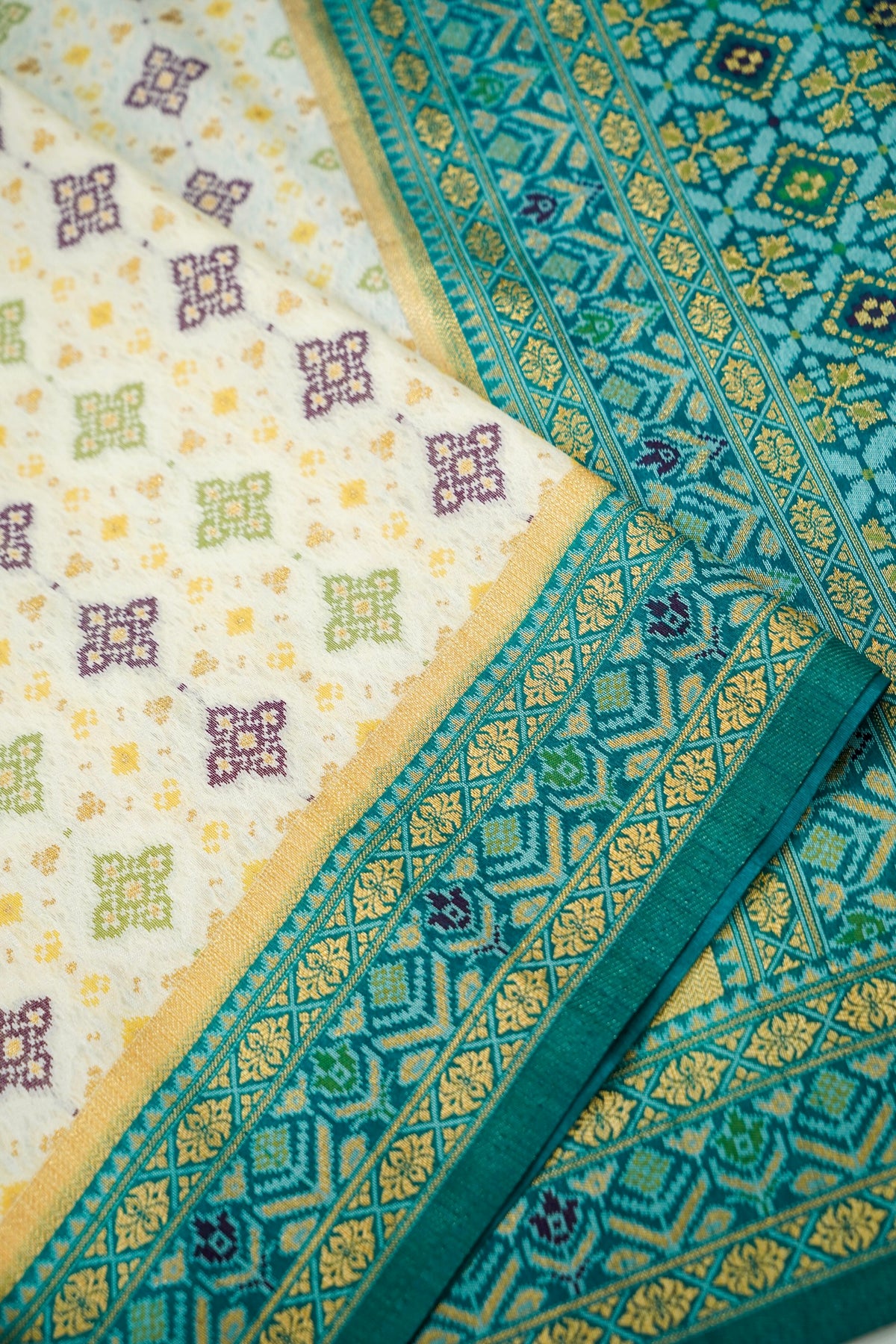 Soft Dupion Silk Ivory Patola Saree with Teal Border