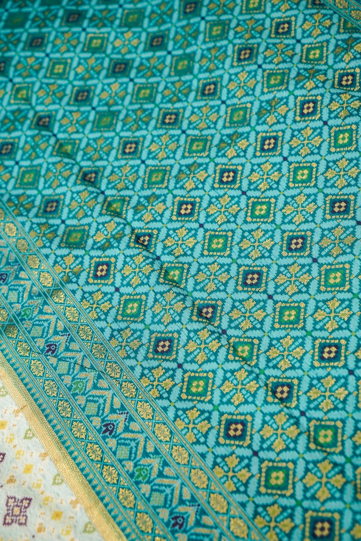 Soft Dupion Silk Ivory Patola Saree with Teal Border
