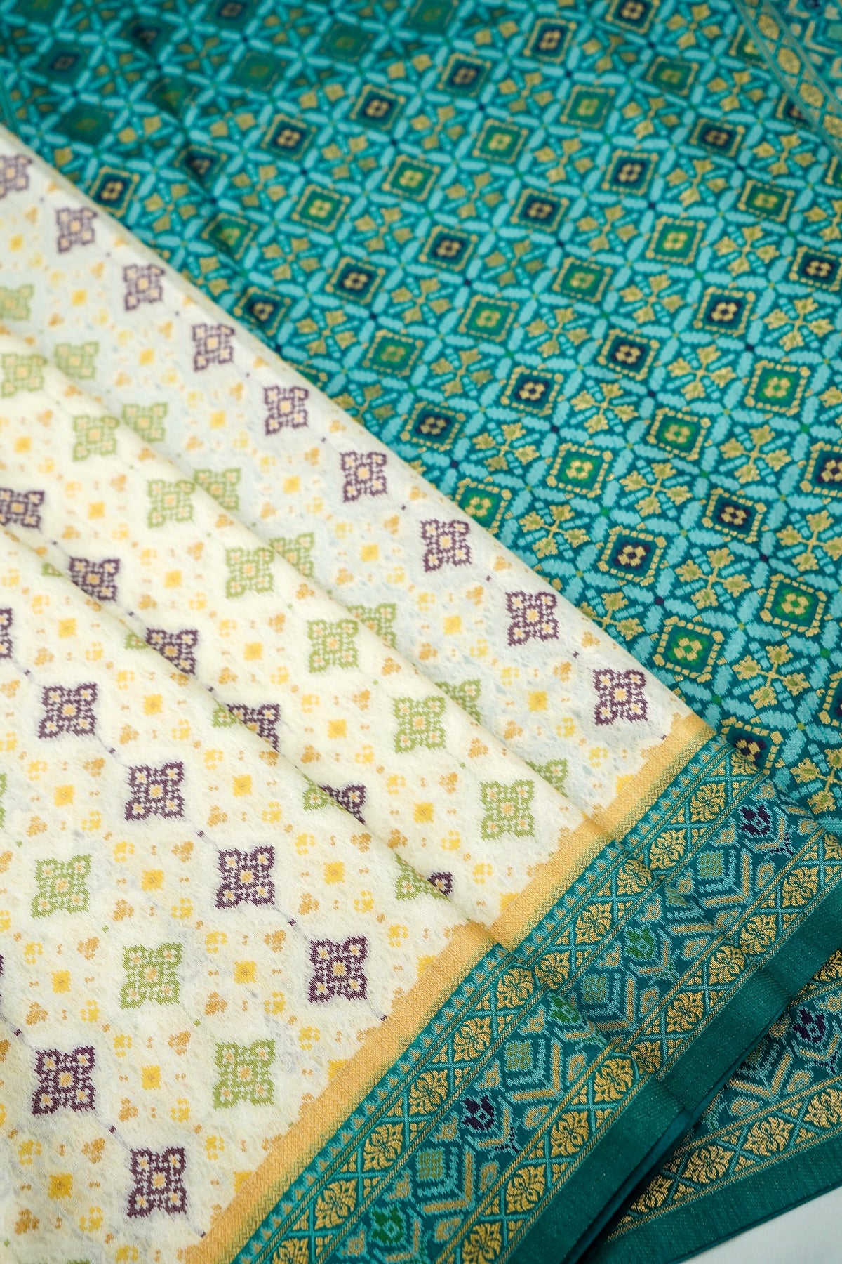 Soft Dupion Silk Ivory Patola Saree with Teal Border