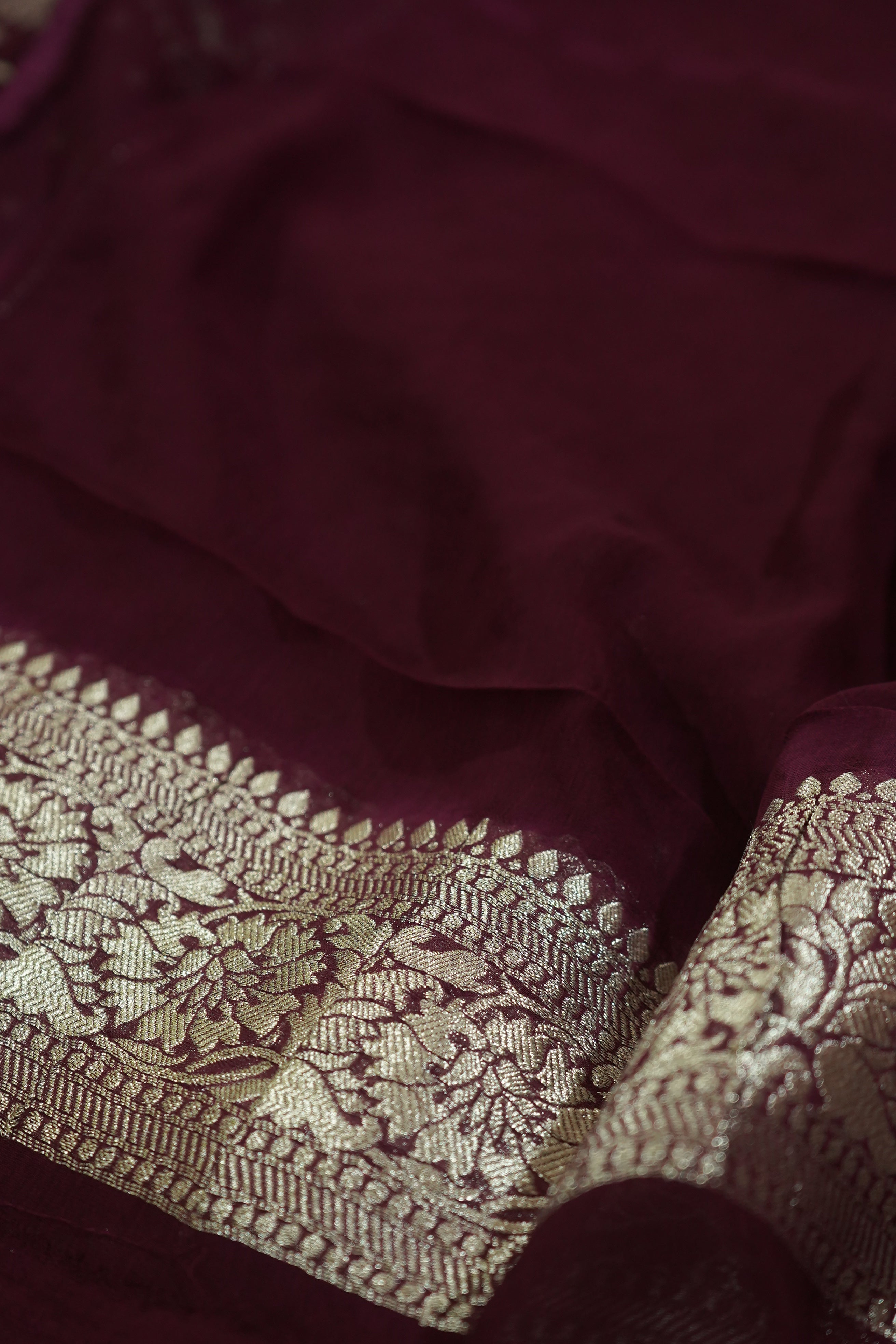 Dark Wine Purple Khaddi Georgette Pure Banarasi Saree with Champagne Zari Border