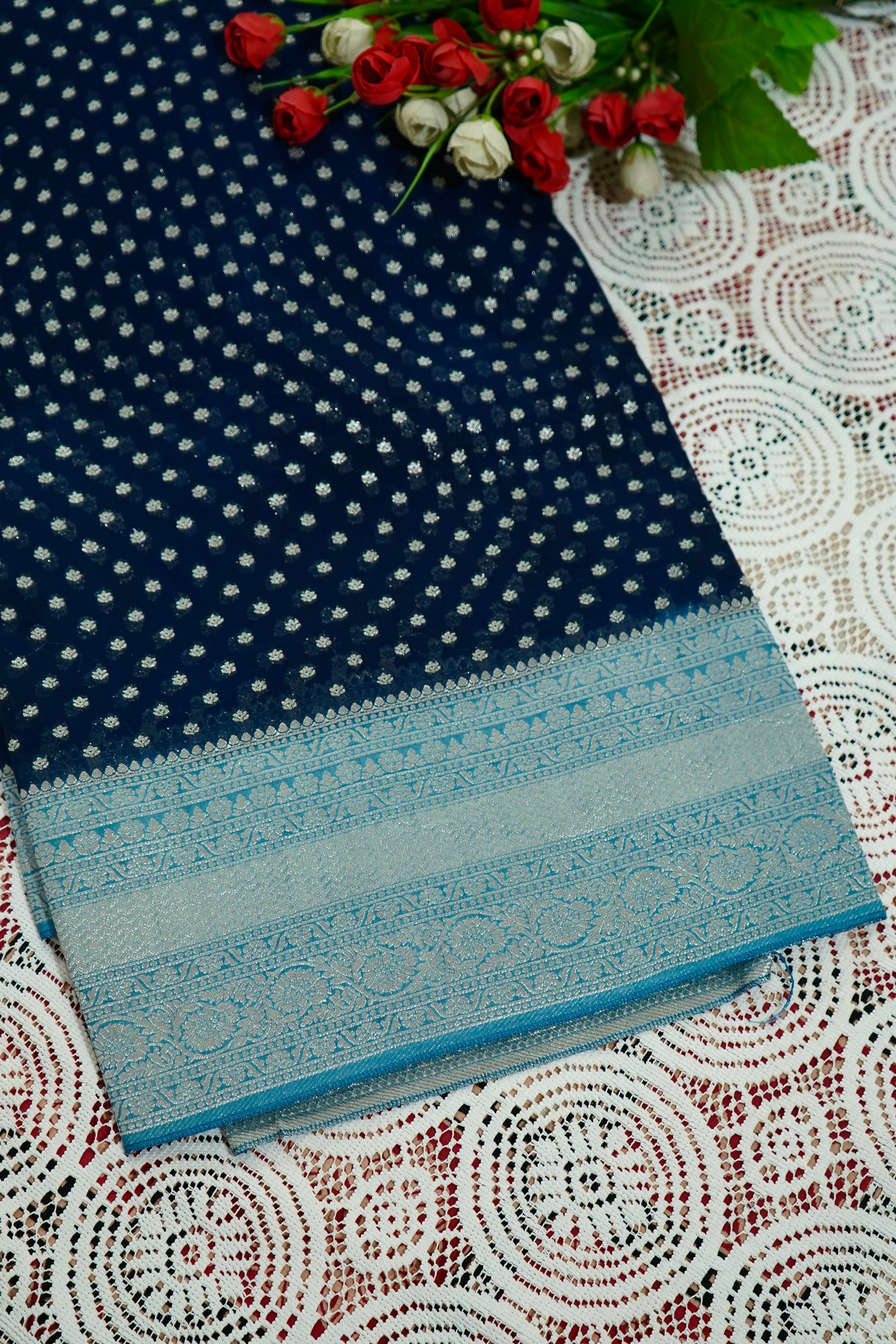 Navy Blue Khaddi Georgette Pure Banarasi Saree with Icy Blue and Champagne Zari Border