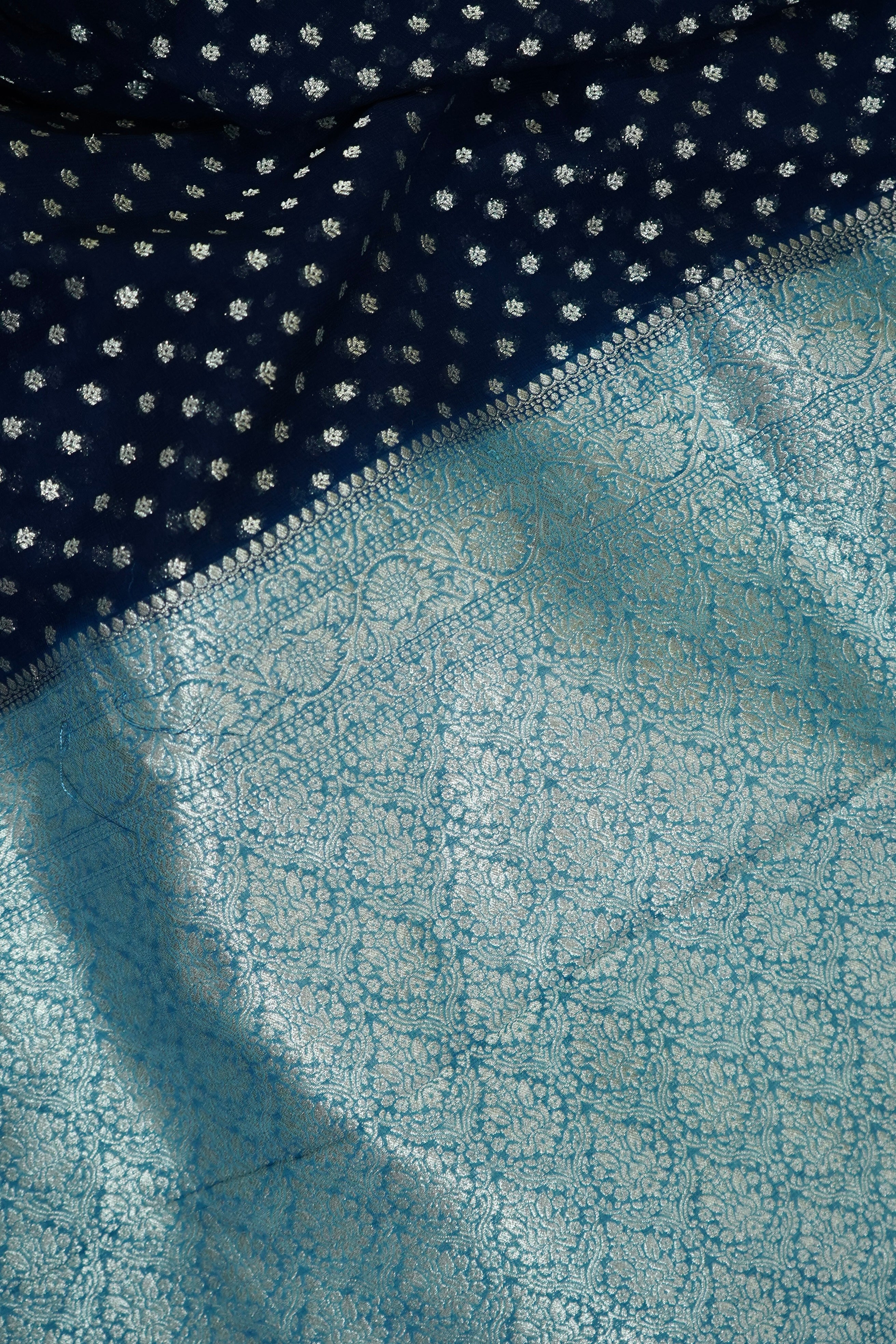 Navy Blue Khaddi Georgette Pure Banarasi Saree with Icy Blue and Champagne Zari Border