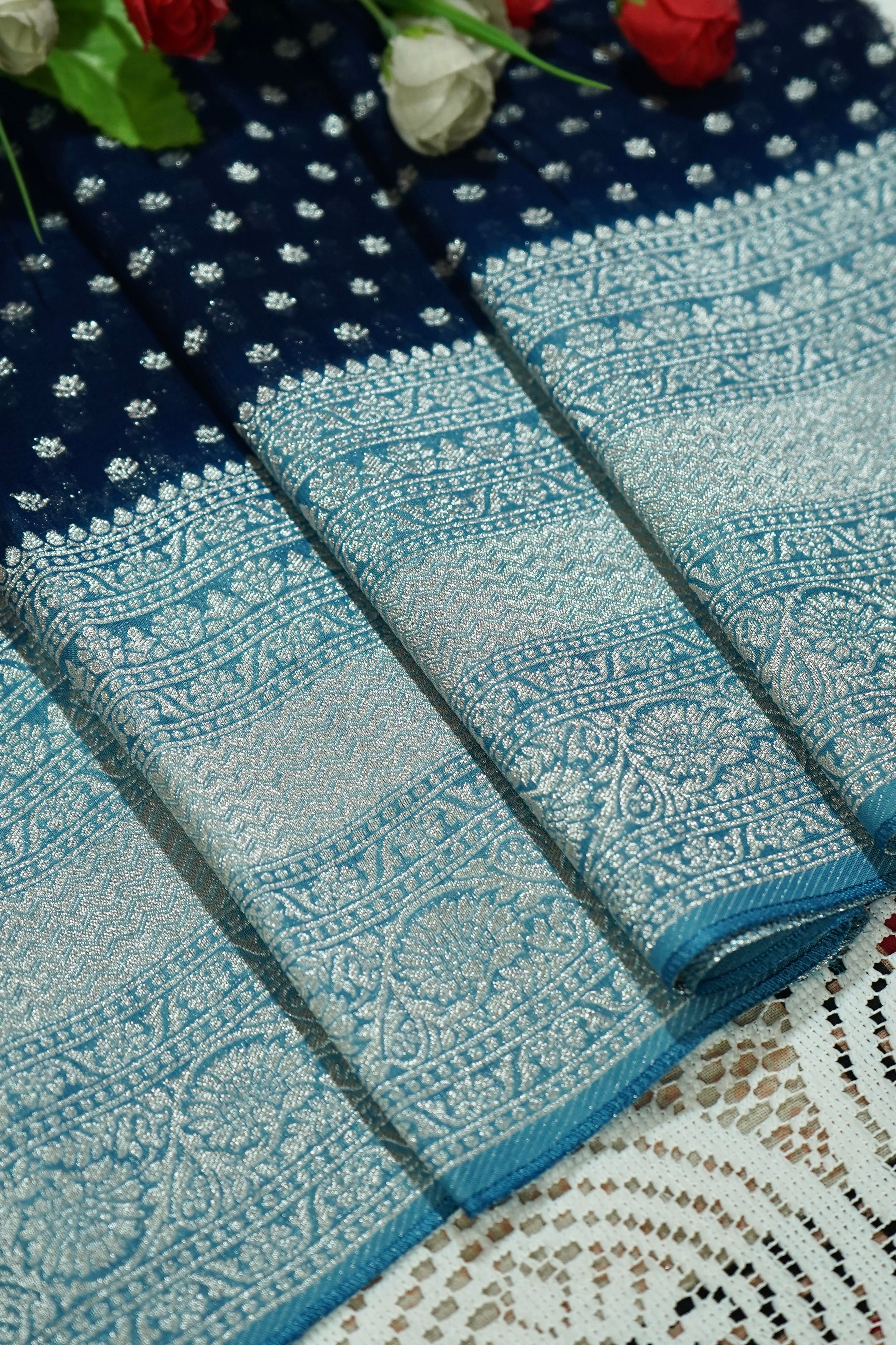 Navy Blue Khaddi Georgette Pure Banarasi Saree with Icy Blue and Champagne Zari Border