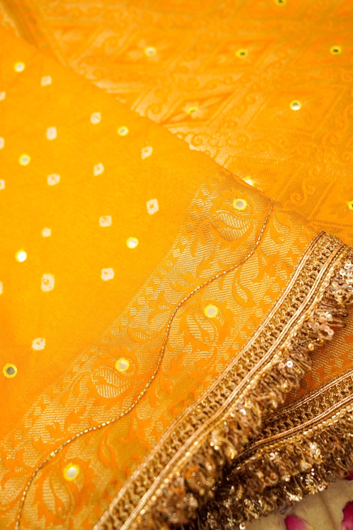 Marigold Yellow Bandhani Saree with Floral Mirror and Fringe Border