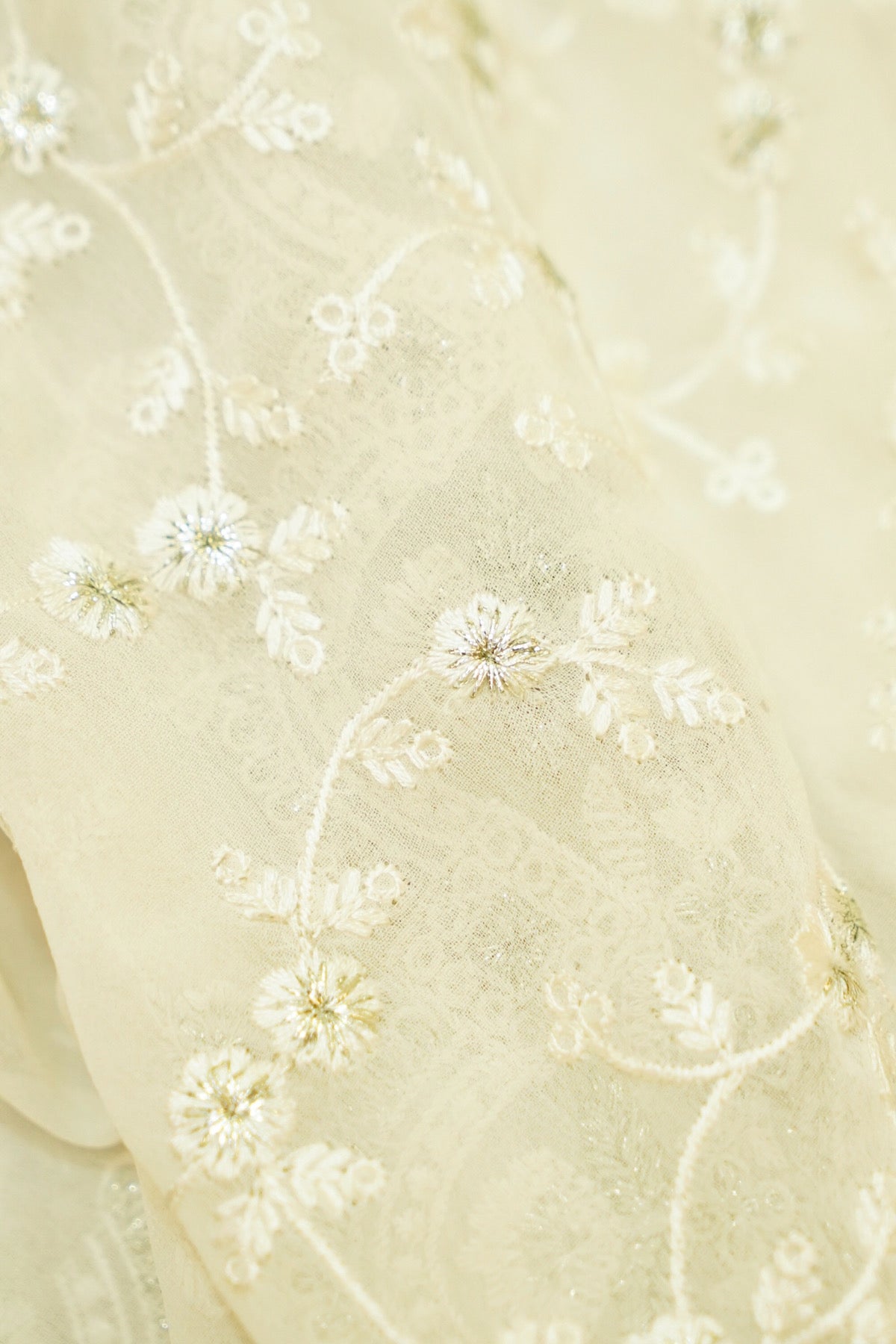 Ivory Floral Embroidered Designer Net Saree with Intricate Border