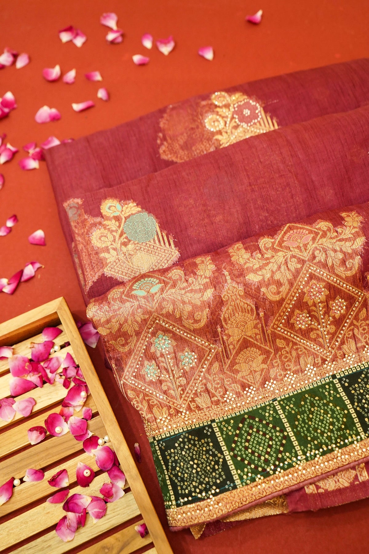 Maroon Designer Tissue Saree with Green & Diamond Detailing Border