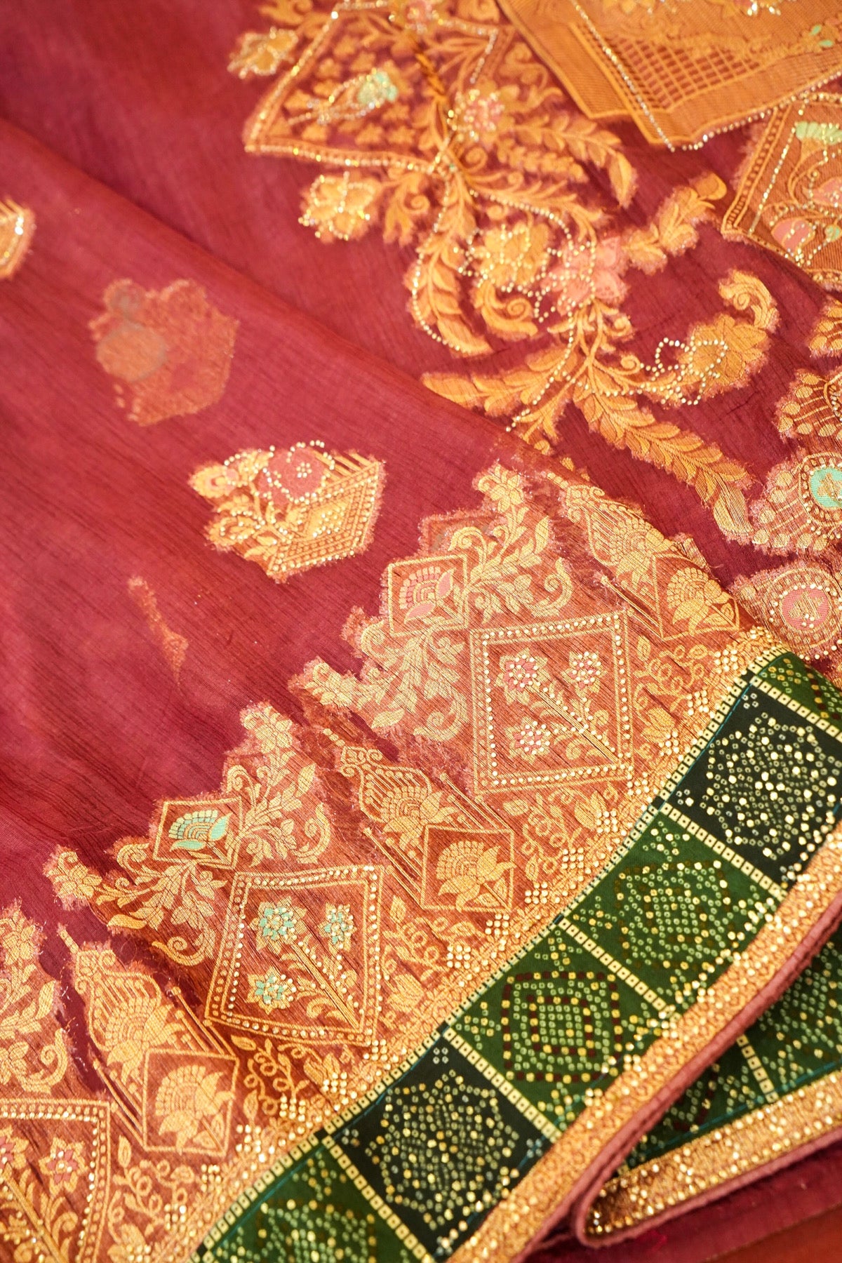 Maroon Designer Tissue Saree with Green & Diamond Detailing Border