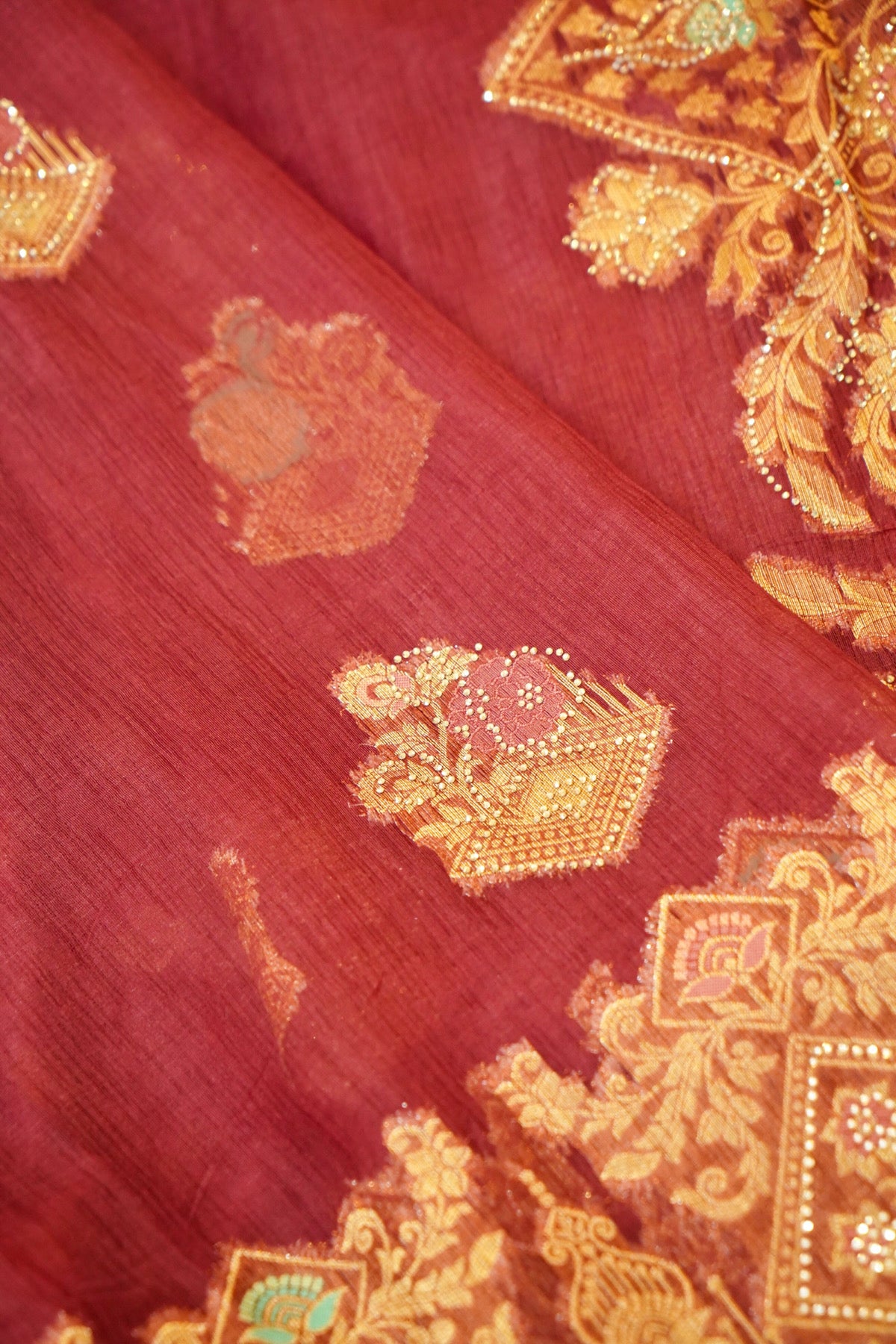Maroon Designer Tissue Saree with Green & Diamond Detailing Border