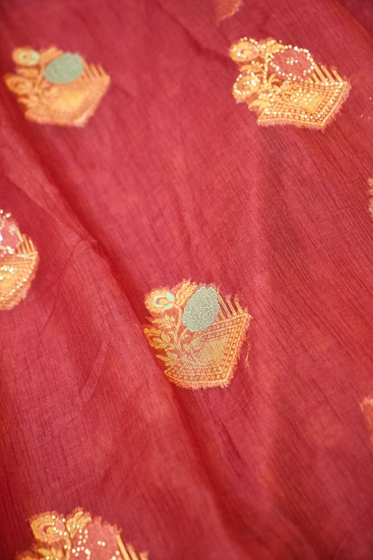 Maroon Designer Tissue Saree with Green & Diamond Detailing Border