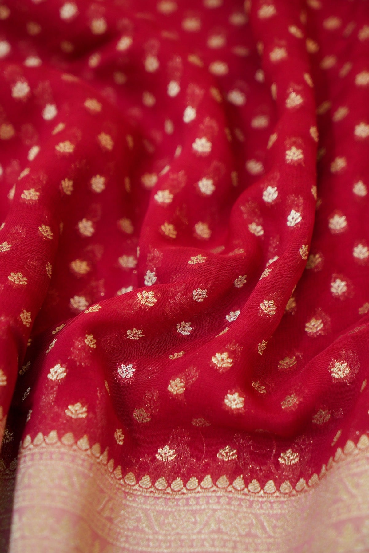 Deep Red Khaddi Georgette Pure Banarasi Saree with Rani Pink and Champagne Zari Border