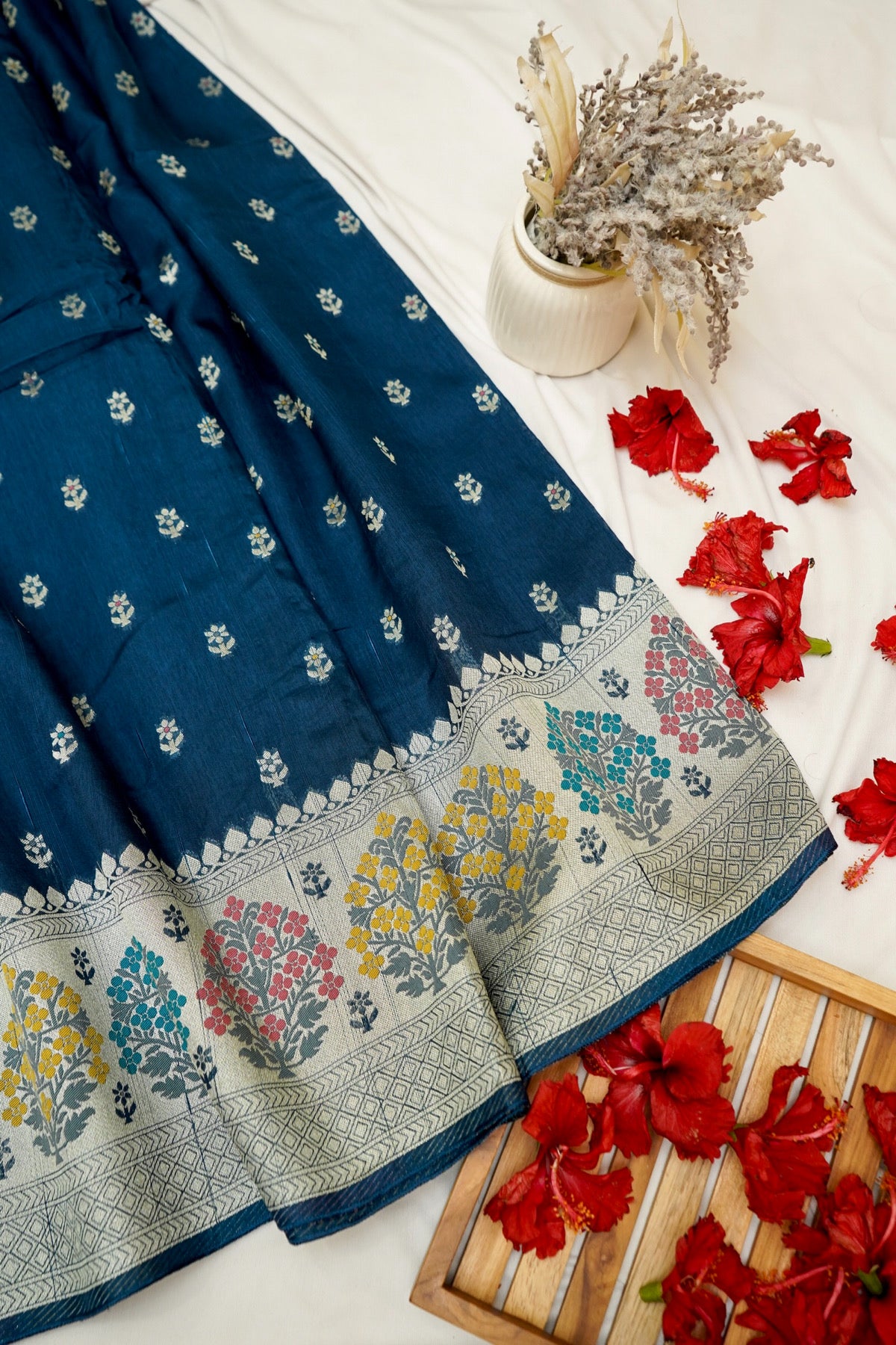 Teal Blue Raw Silk Saree with Multicolor Tree Weave Border