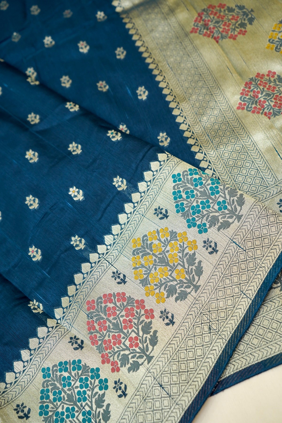 Teal Blue Raw Silk Saree with Multicolor Tree Weave Border