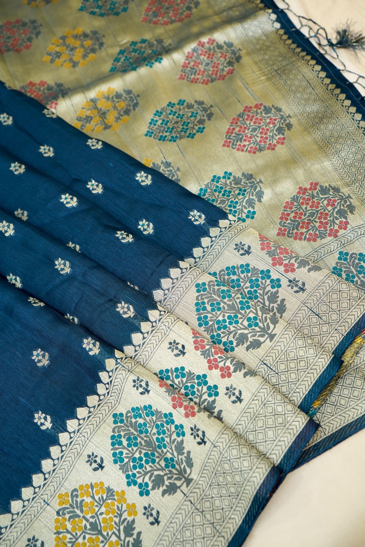 Teal Blue Raw Silk Saree with Multicolor Tree Weave Border