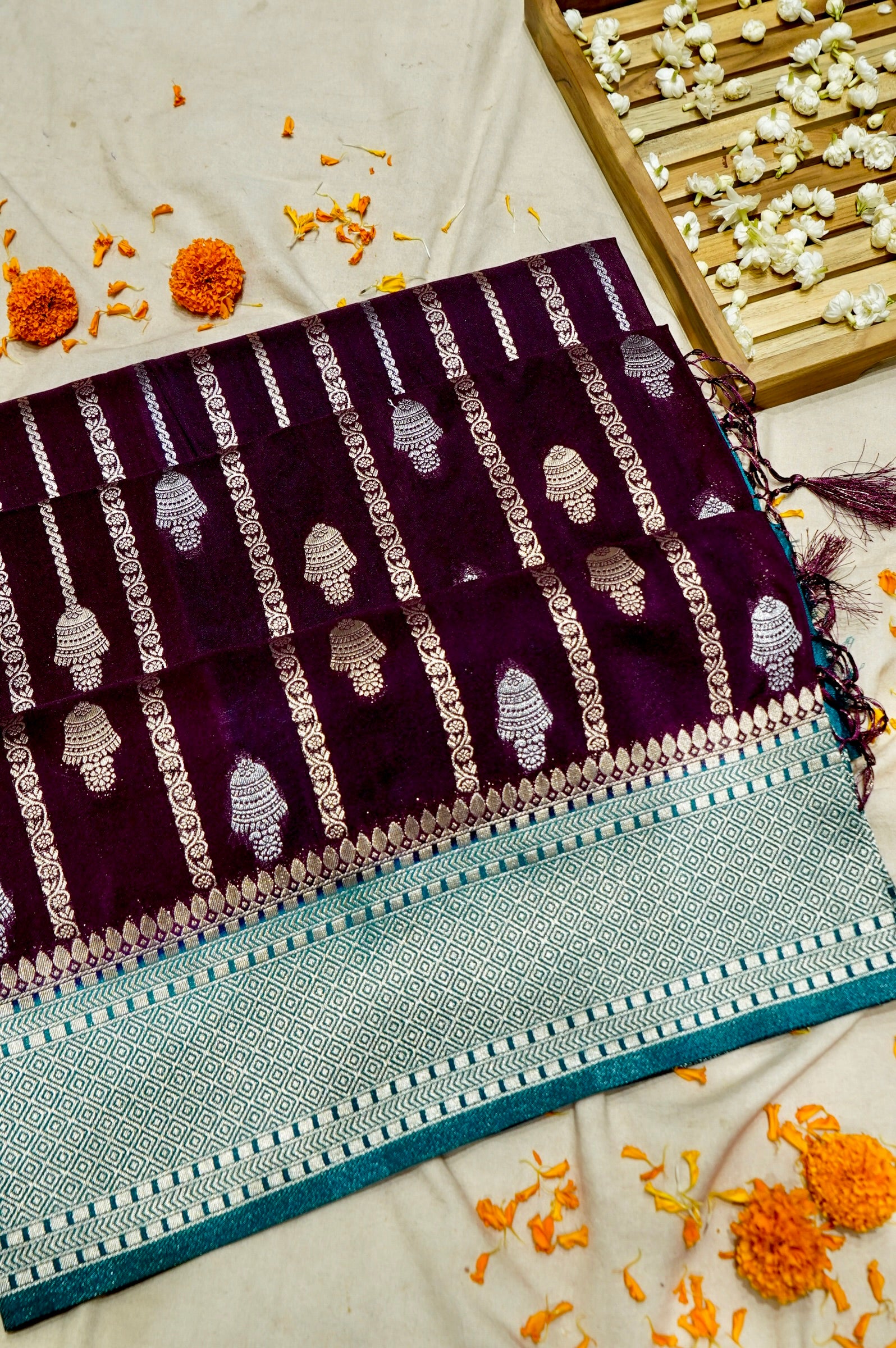 Wine Purple Bell Motifs Crepe Georgette Silk Saree with Teal Border