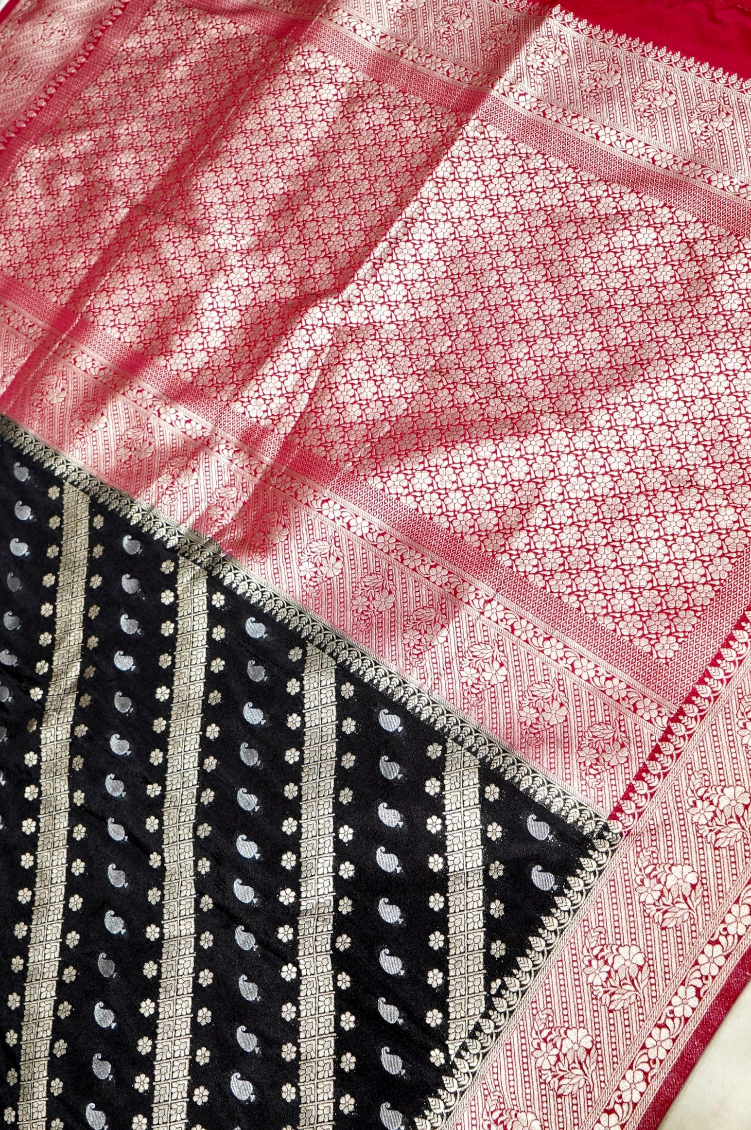 Jet Black Paisley Crepe Georgette Silk Saree with Rani Pink Border
