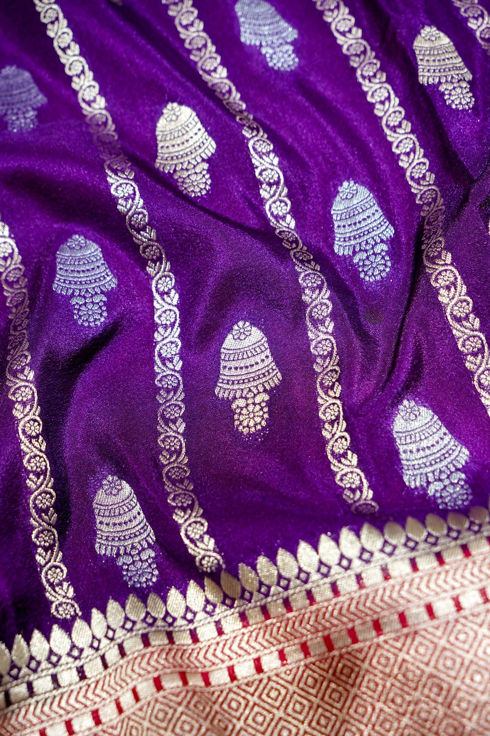Royal Purple Bell Motifs Crepe Georgette Silk Saree with Crimson Red Border