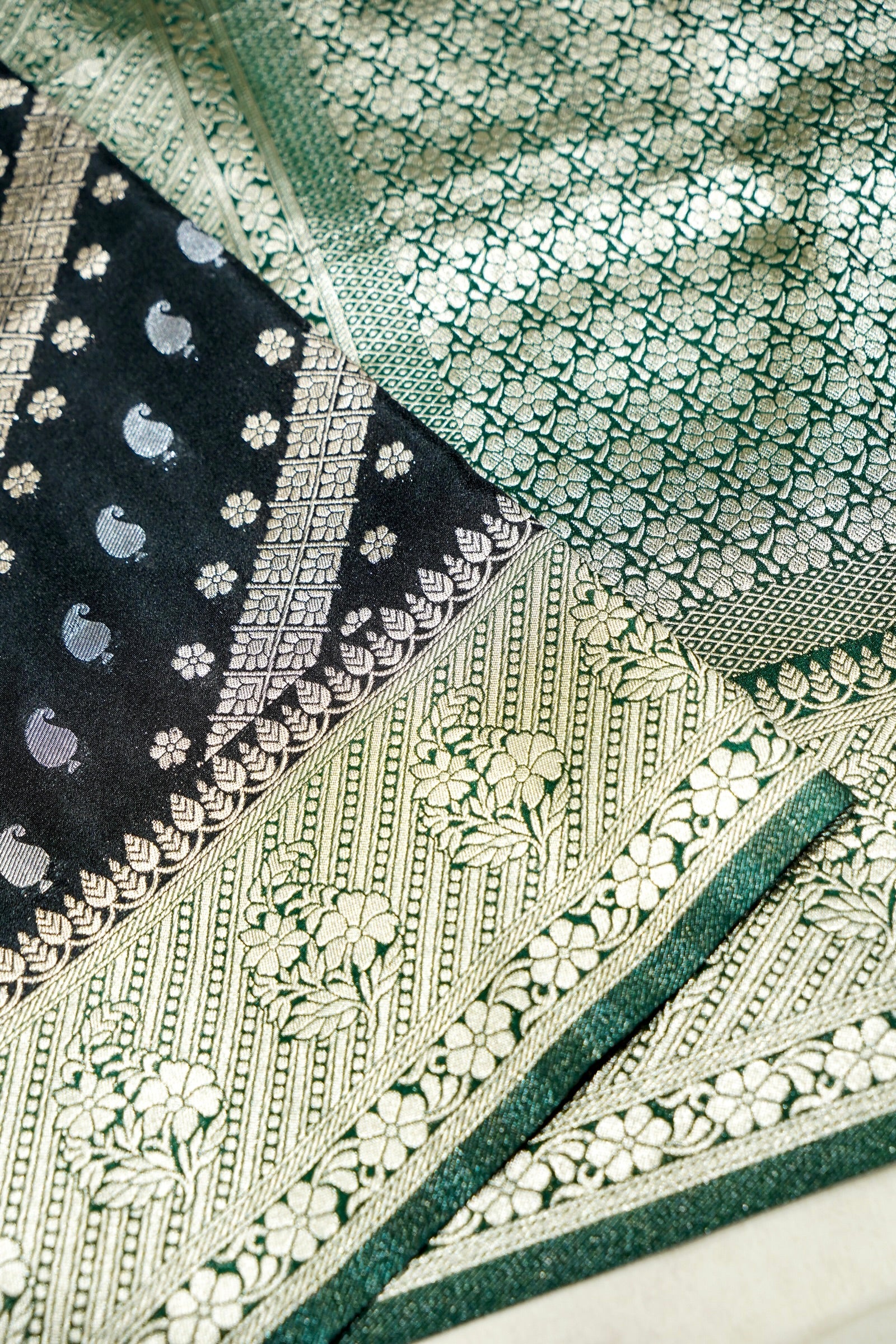 Jet Black Paisley Crepe Georgette Silk Saree with Green Border
