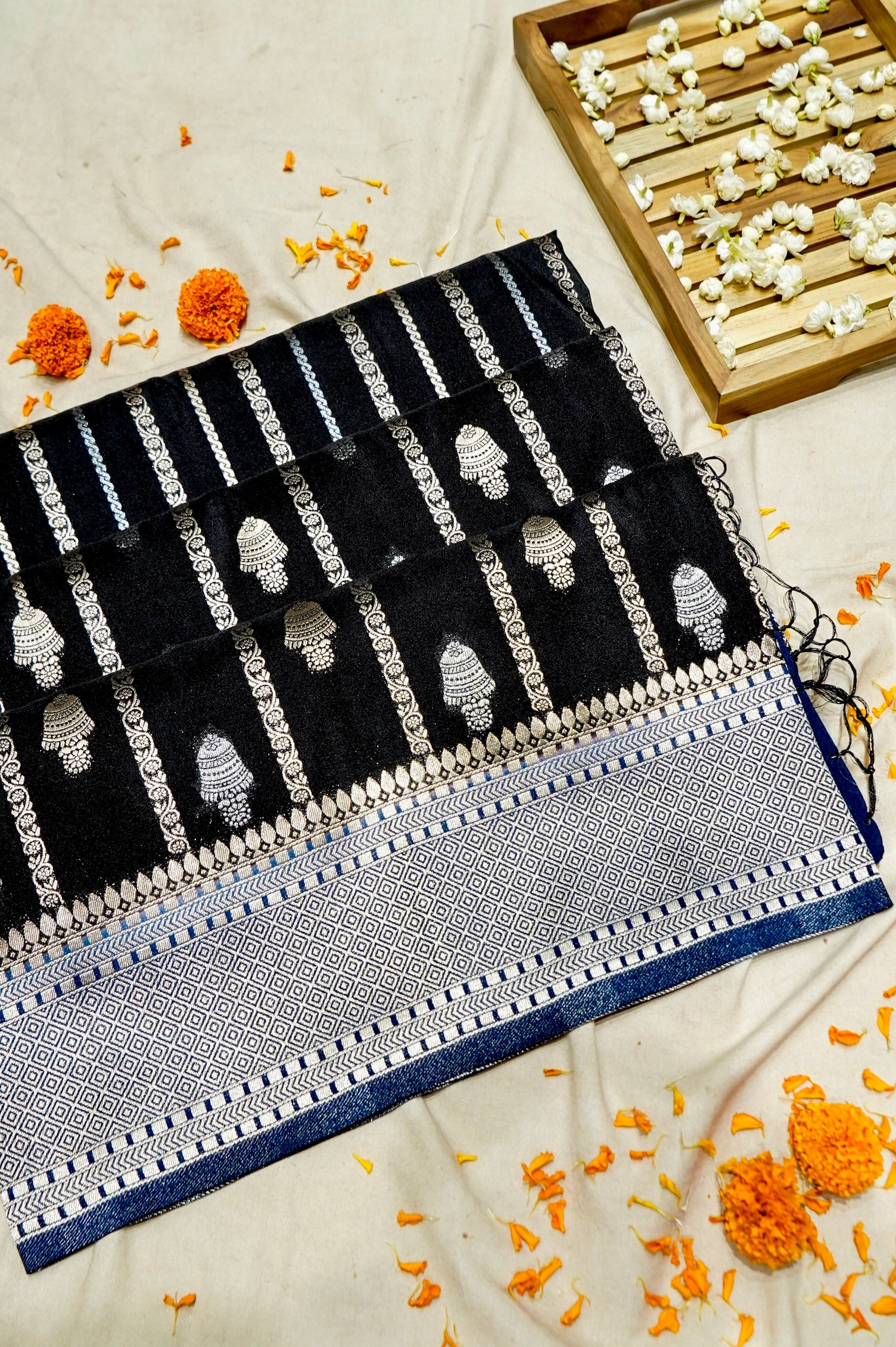 Jet Black Bell Motifs Crepe Georgette Silk Saree with Royal Blue Border