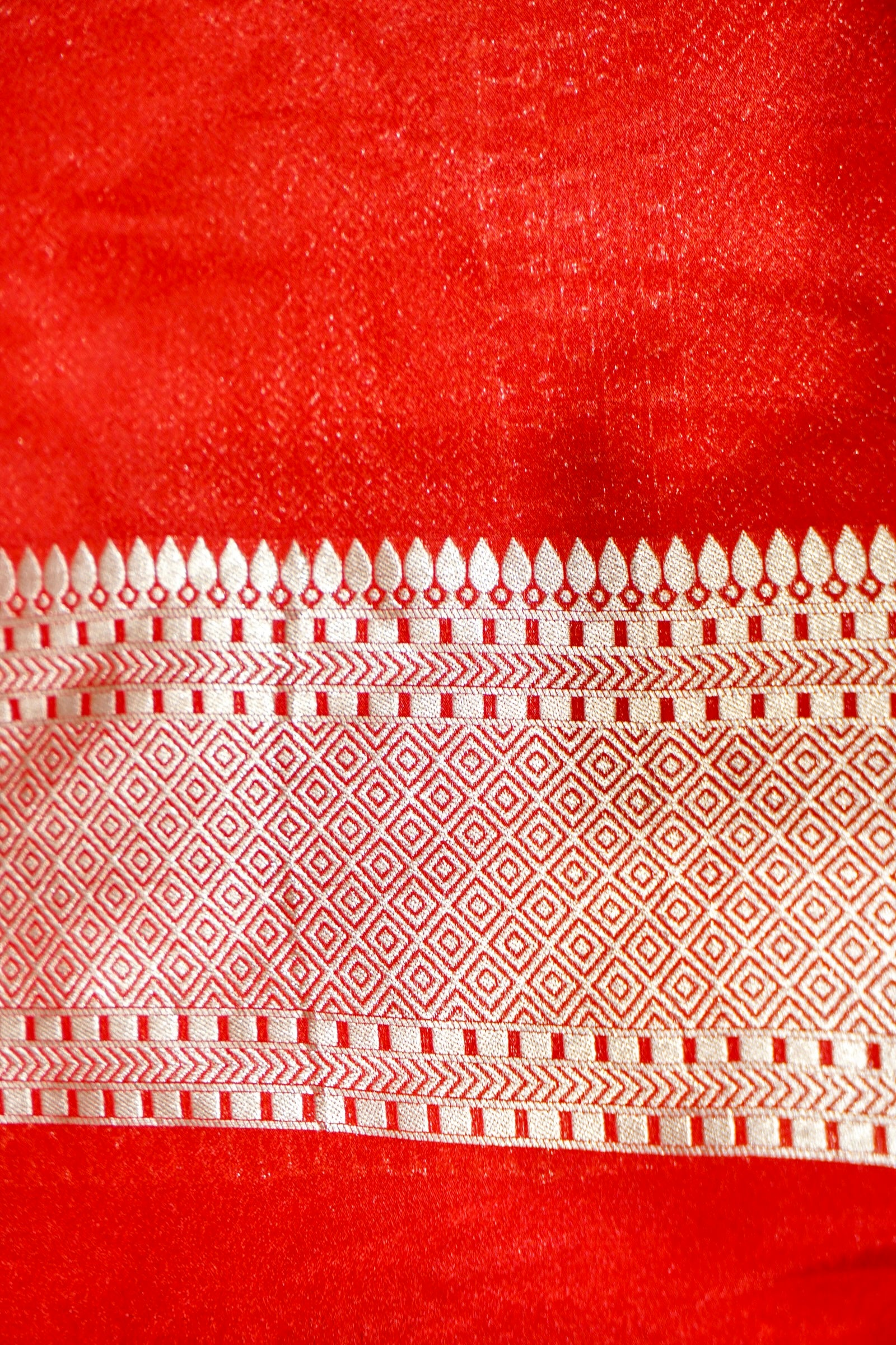 Bottle Green Bell Motifs Crepe Georgette Silk Saree with Red Border