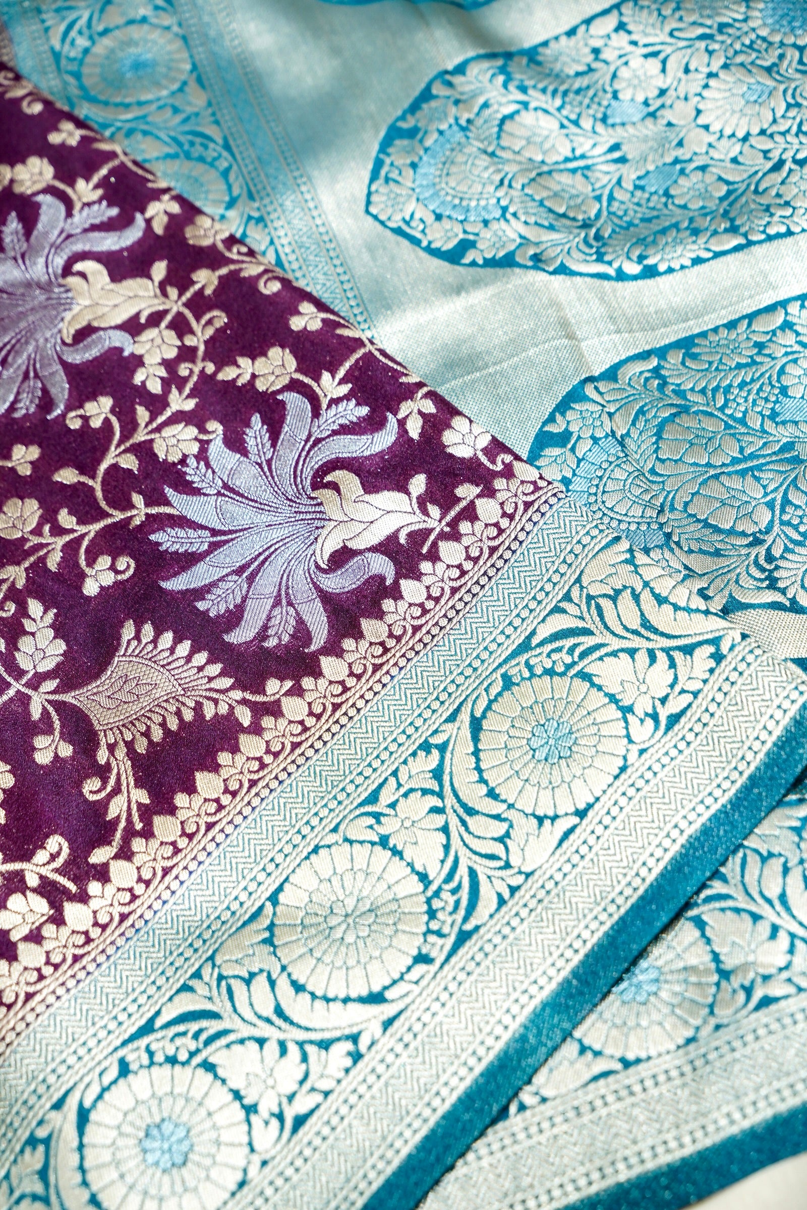 Wine Purple Crepe Georgette Silk Saree with Sea Green Border and Gold - Silver Weave
